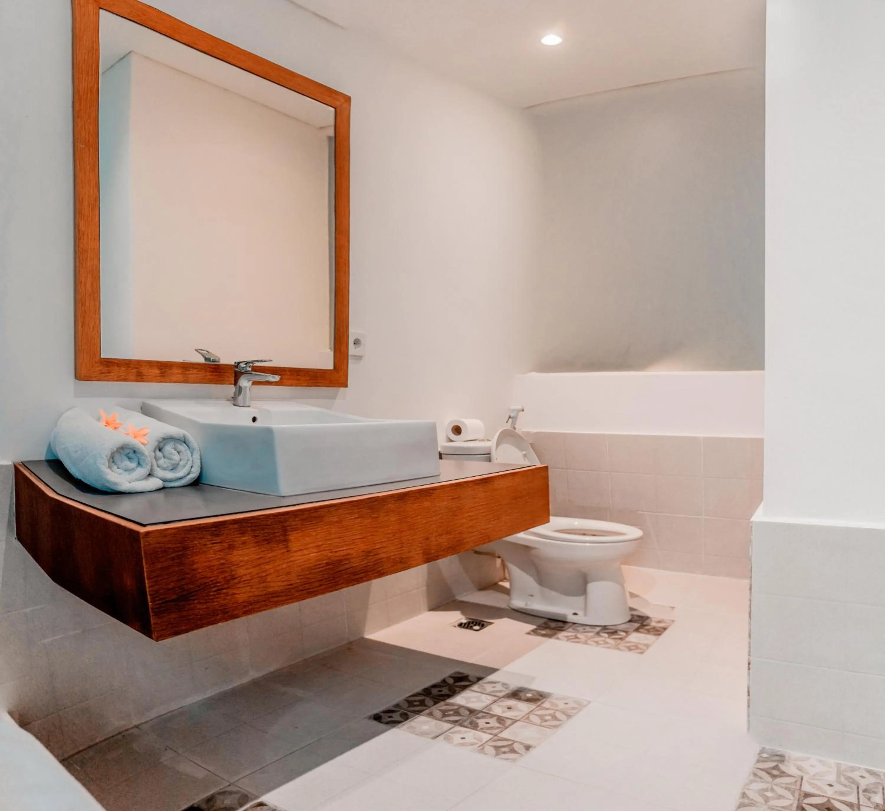 Toilet in Sunrise Suite Seminyak by ARM Hospitality