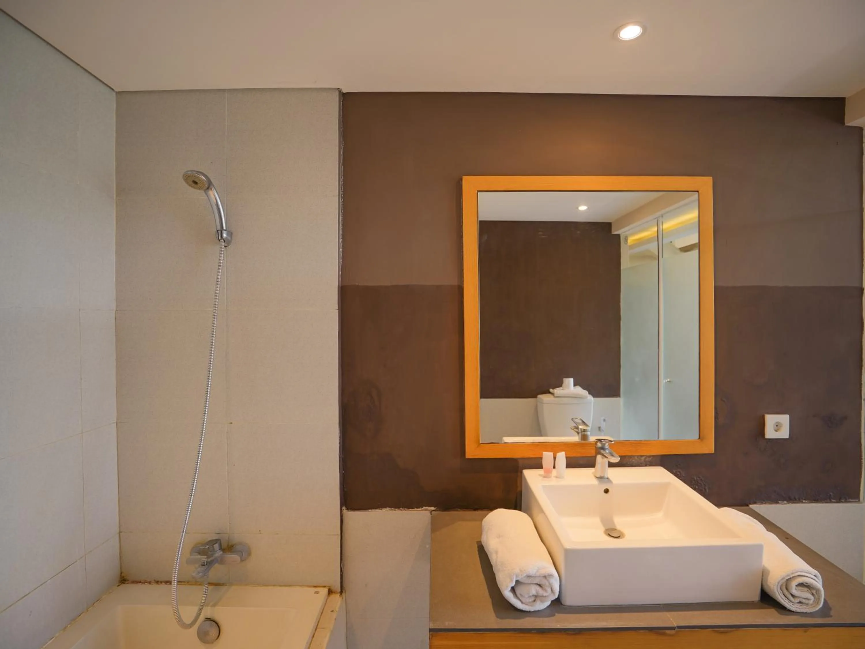 Bed in Sunrise Suite Seminyak by ARM Hospitality