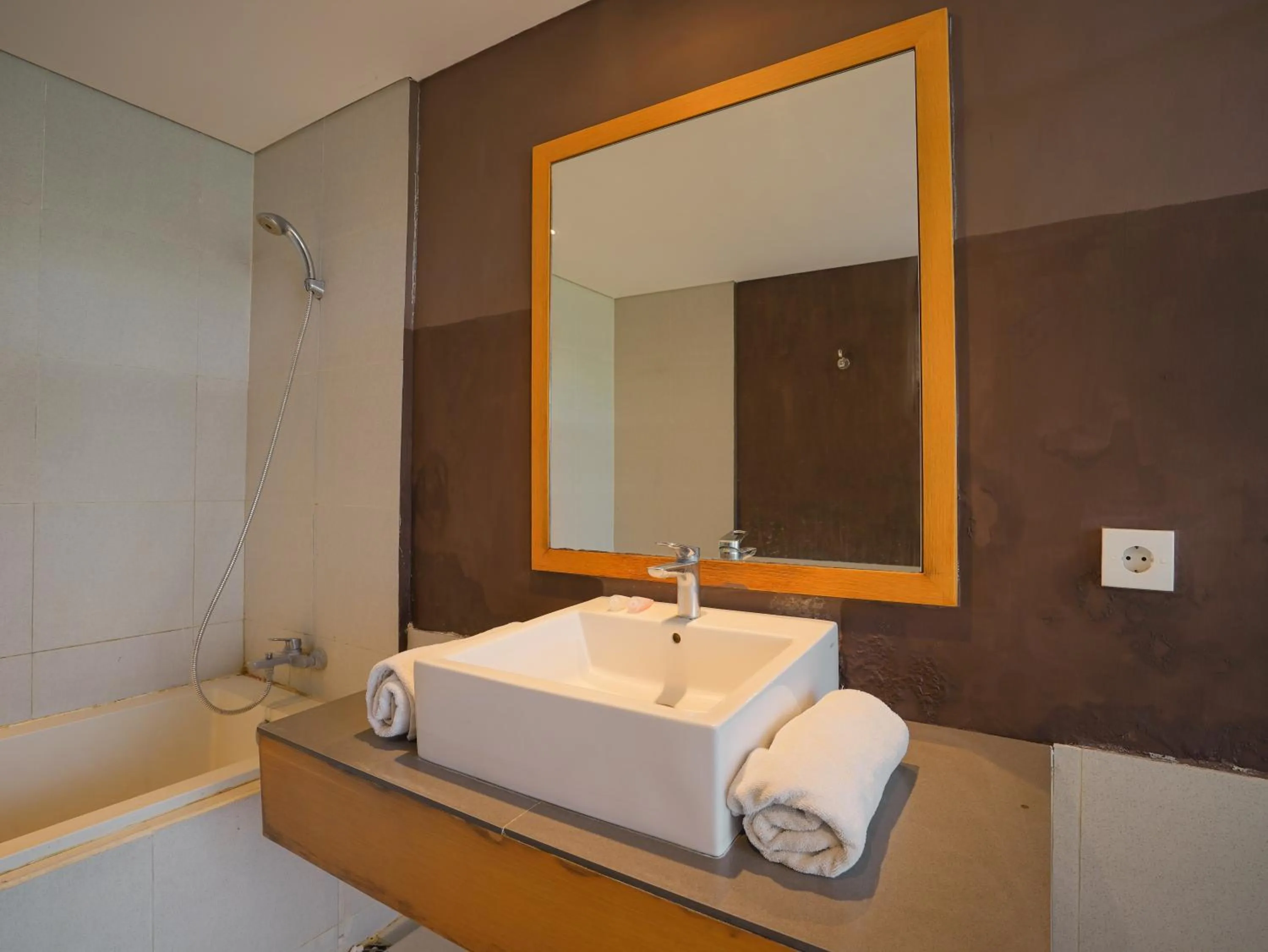 Bed in Sunrise Suite Seminyak by ARM Hospitality