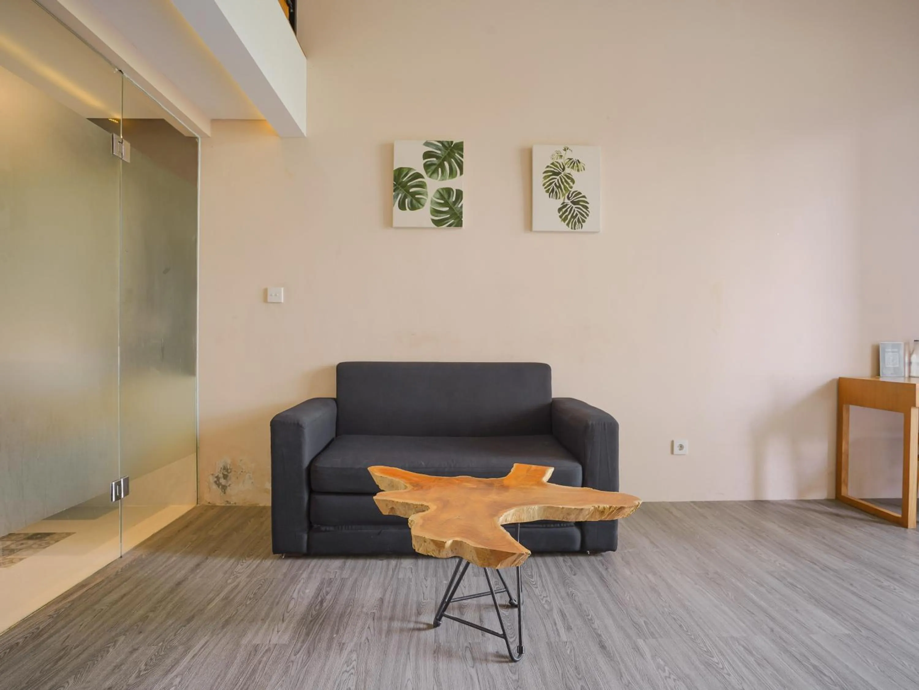 Living room in Sunrise Suite Seminyak by ARM Hospitality