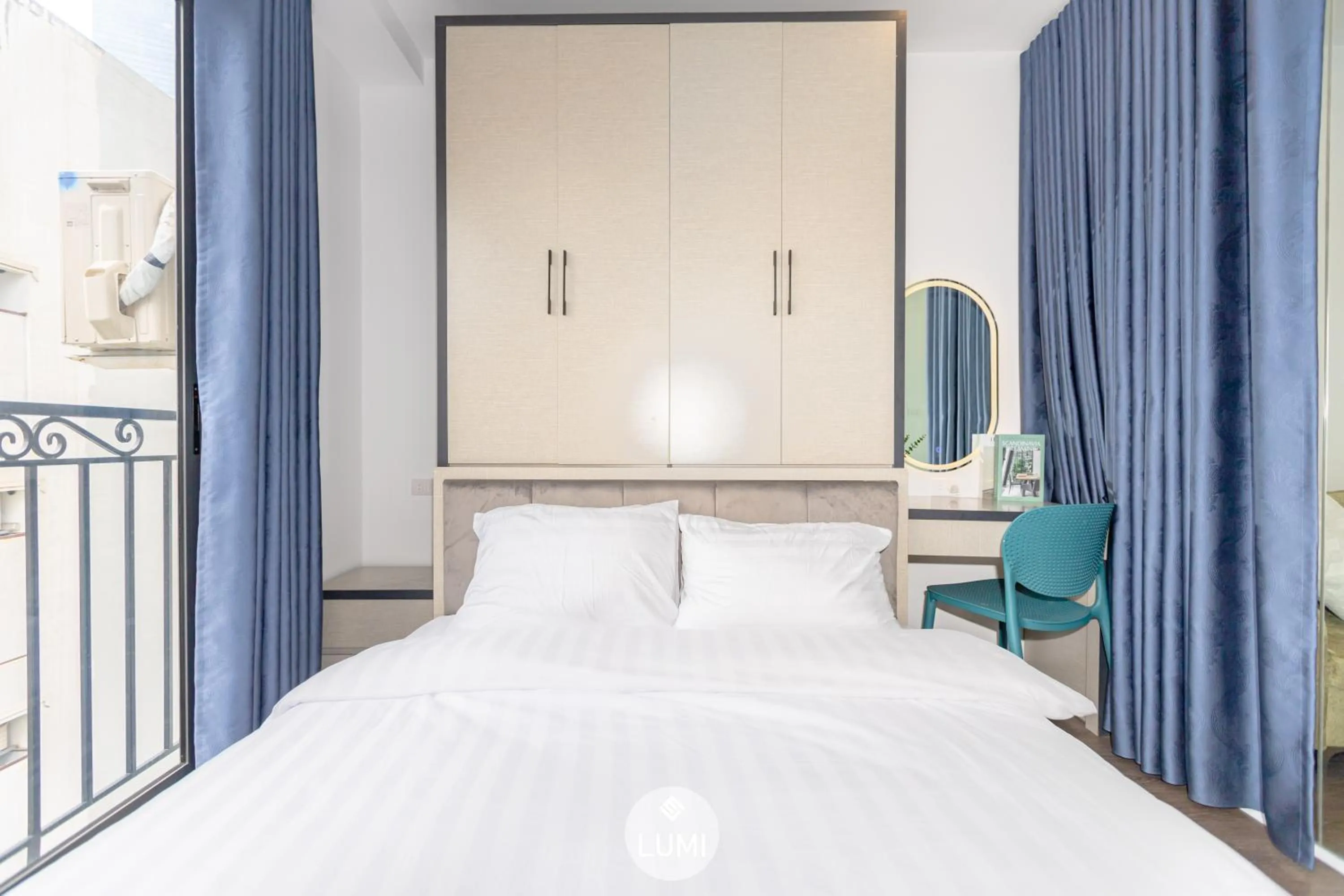 Bed in LUMI Hotel & Apartment