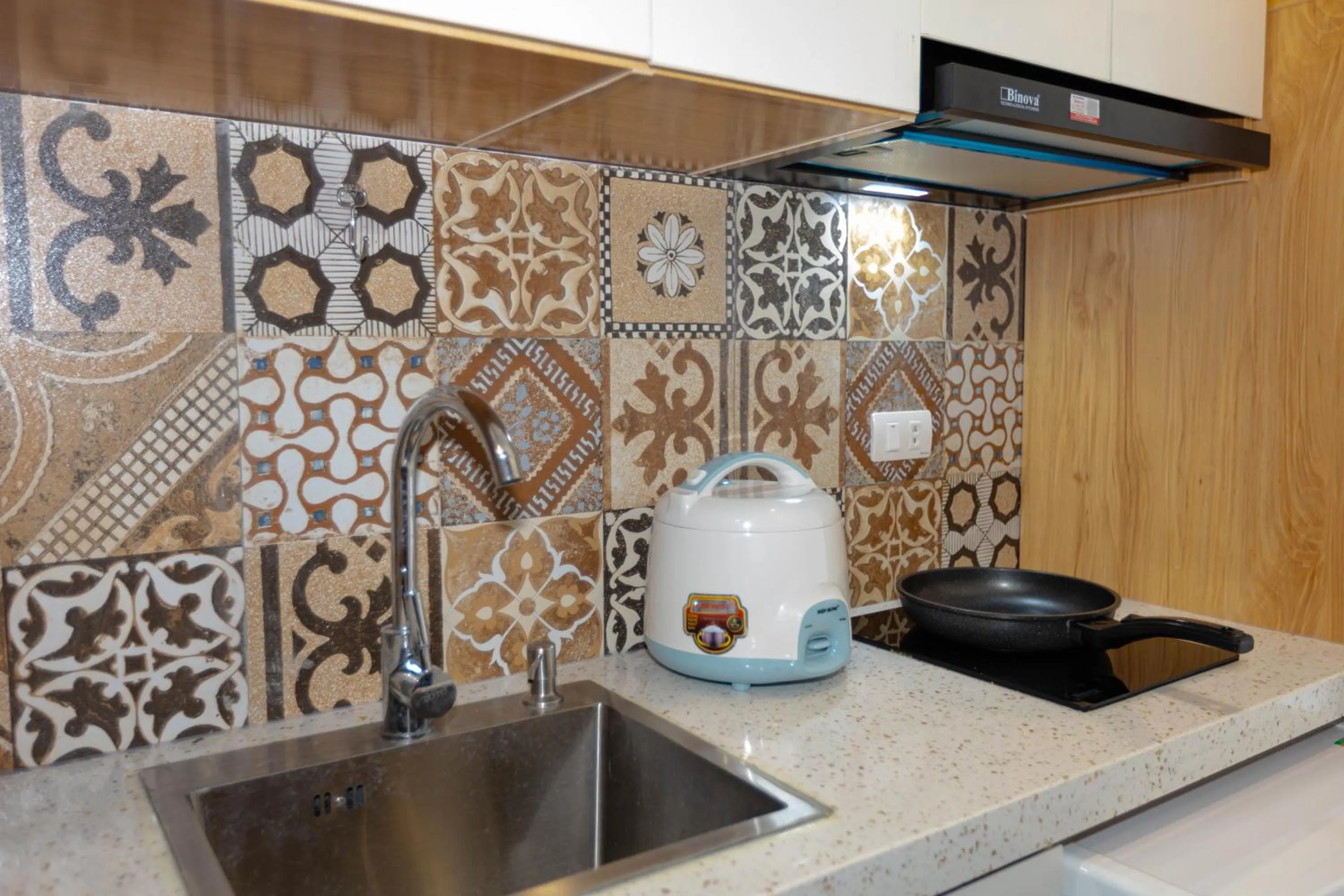kitchen in LUMI Hotel & Apartment