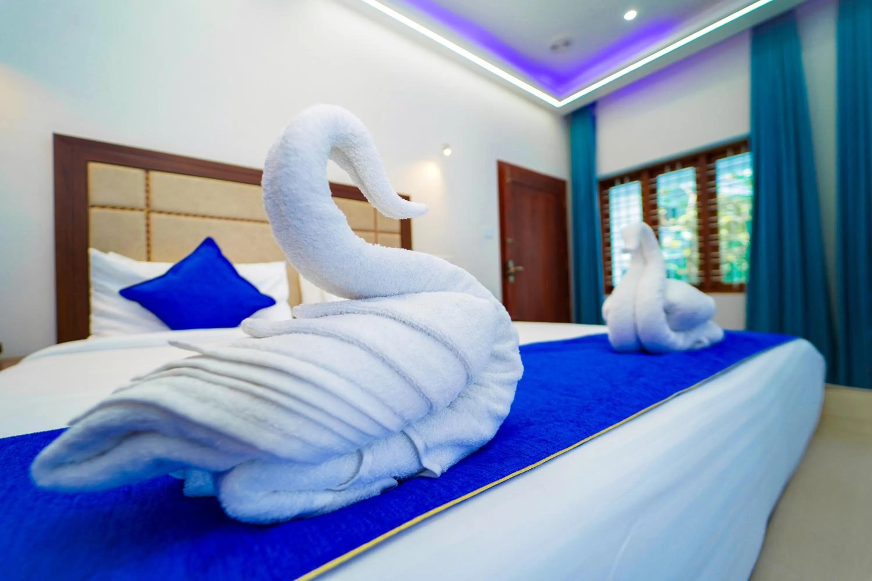 Bed in Skylar Seaview Beach Resort & Ayurveda Varkala