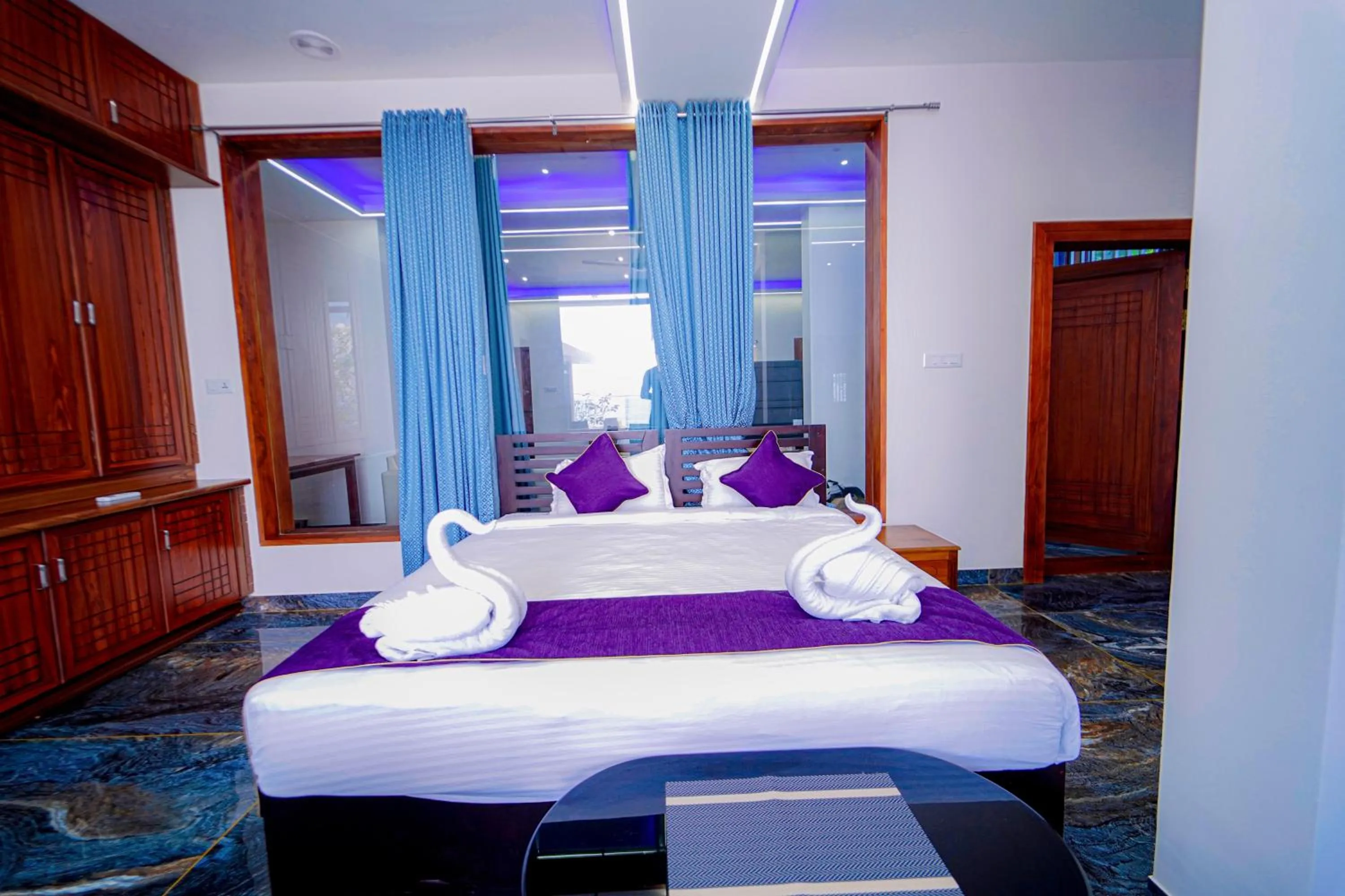 Bed in Skylar Seaview Beach Resort & Ayurveda Varkala