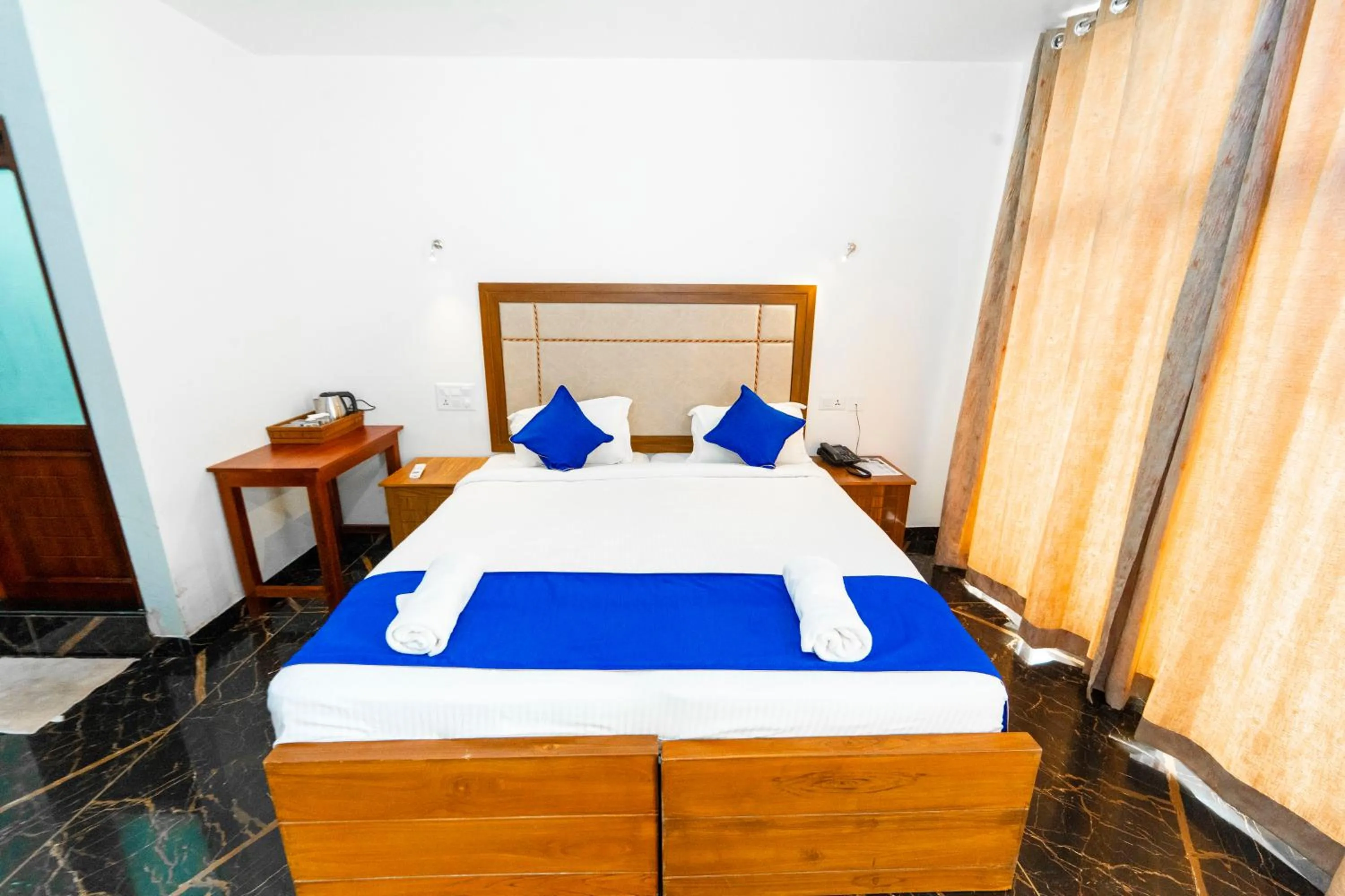 Bed in Skylar Seaview Beach Resort & Ayurveda Varkala