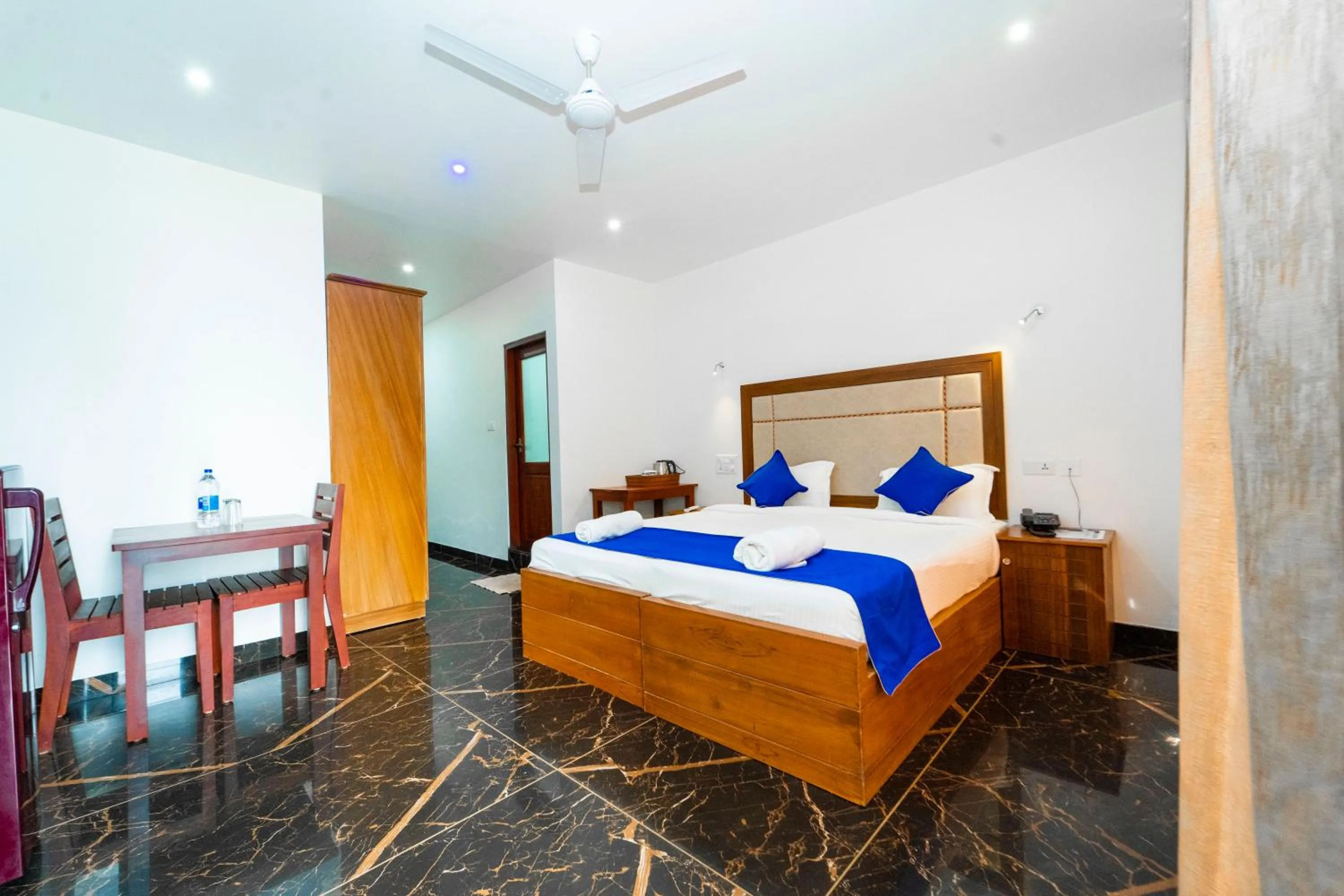 Bed in Skylar Seaview Beach Resort & Ayurveda Varkala