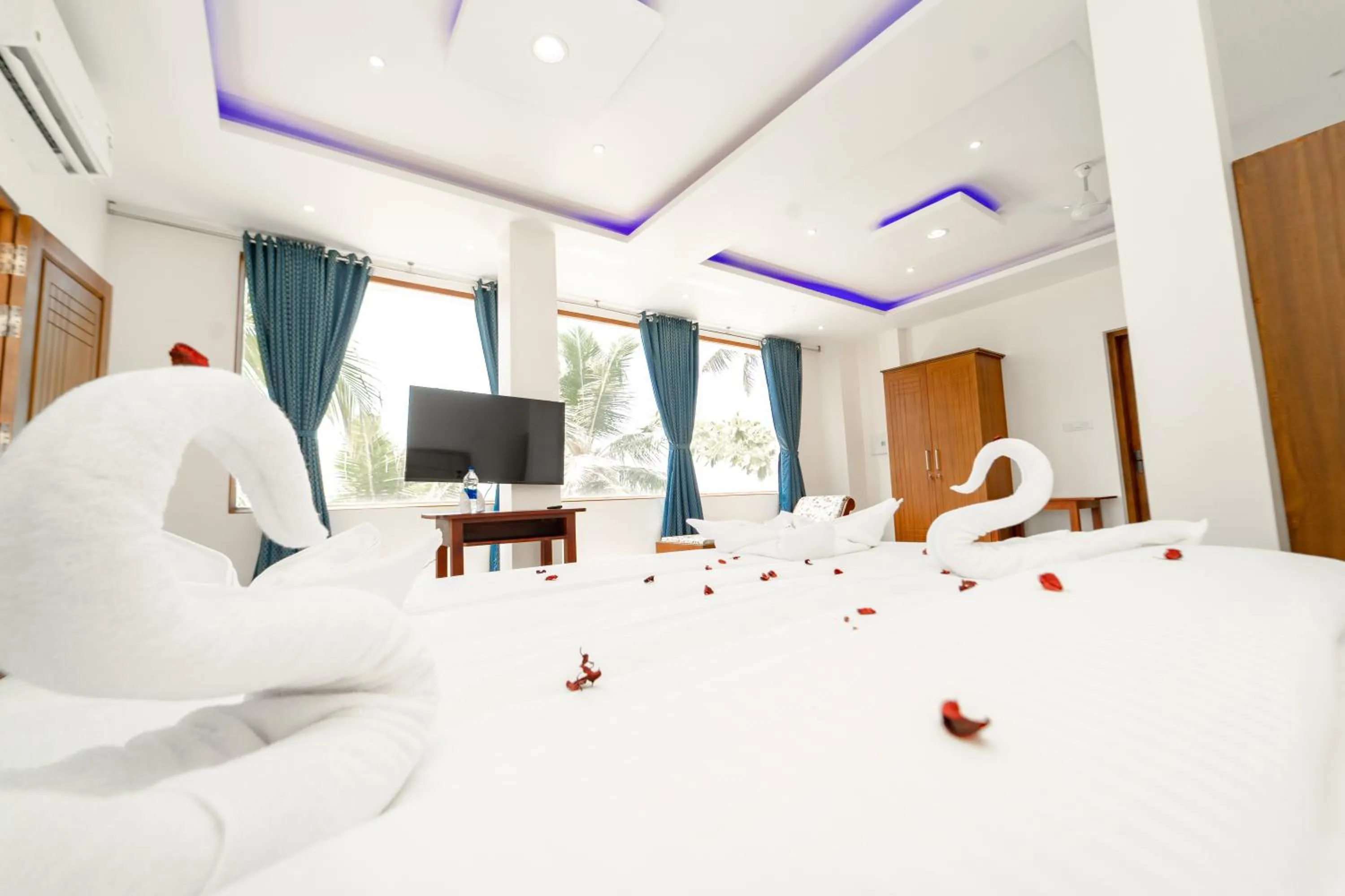 Bed in Skylar Seaview Beach Resort & Ayurveda Varkala