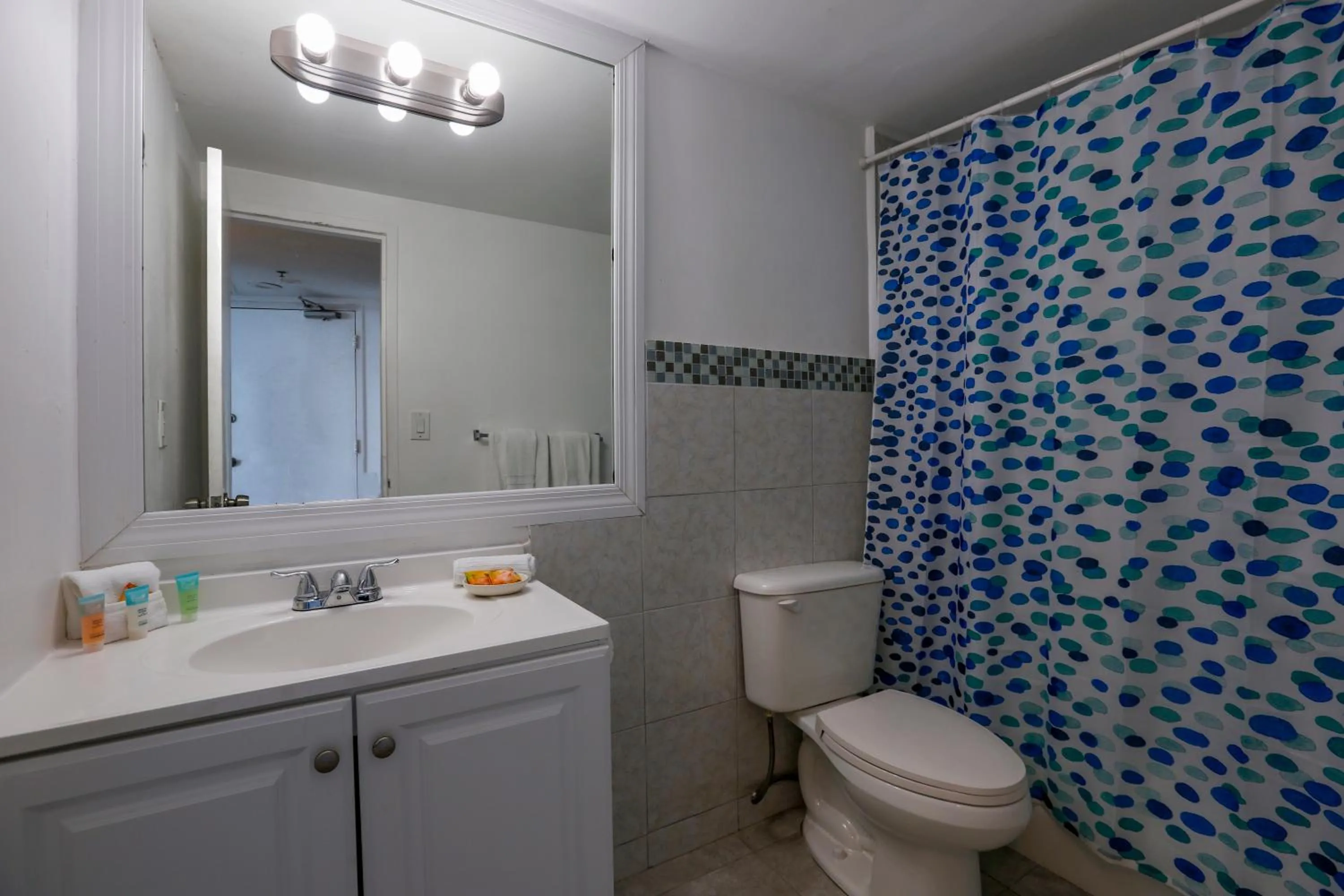 Toilet in Miami Beach Apartments by MiaRentals