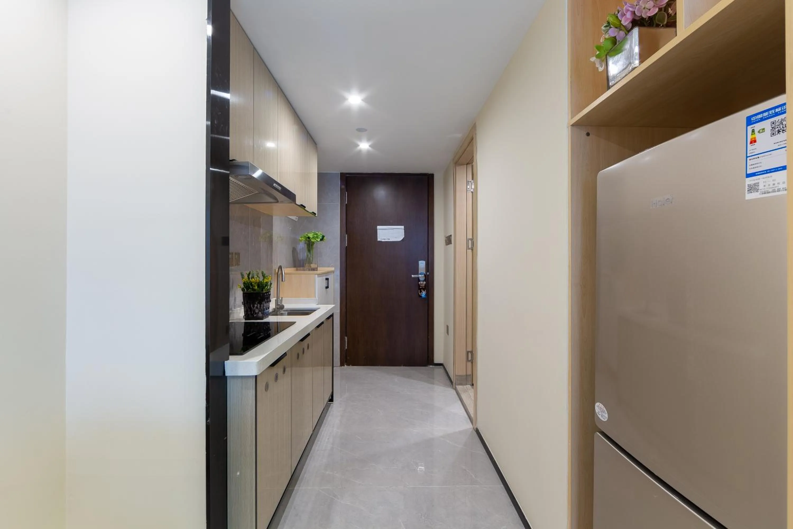 Kitchen or kitchenette in Serveyou International Apartment - Free Airport Pickup & Free Canton Fair Shuttle Bus