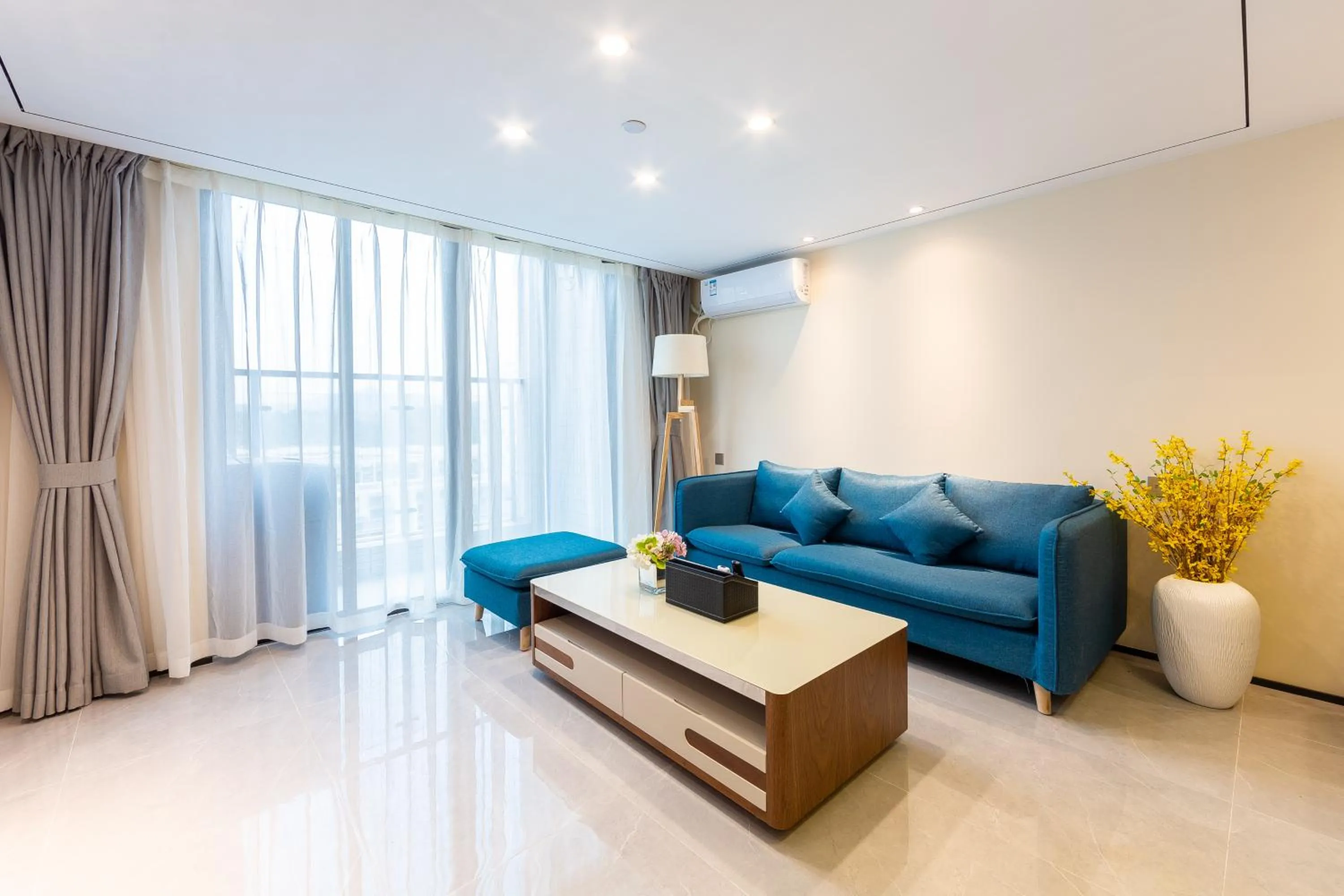 Living room in Serveyou International Apartment - Free Airport Pickup & Free Canton Fair Shuttle Bus