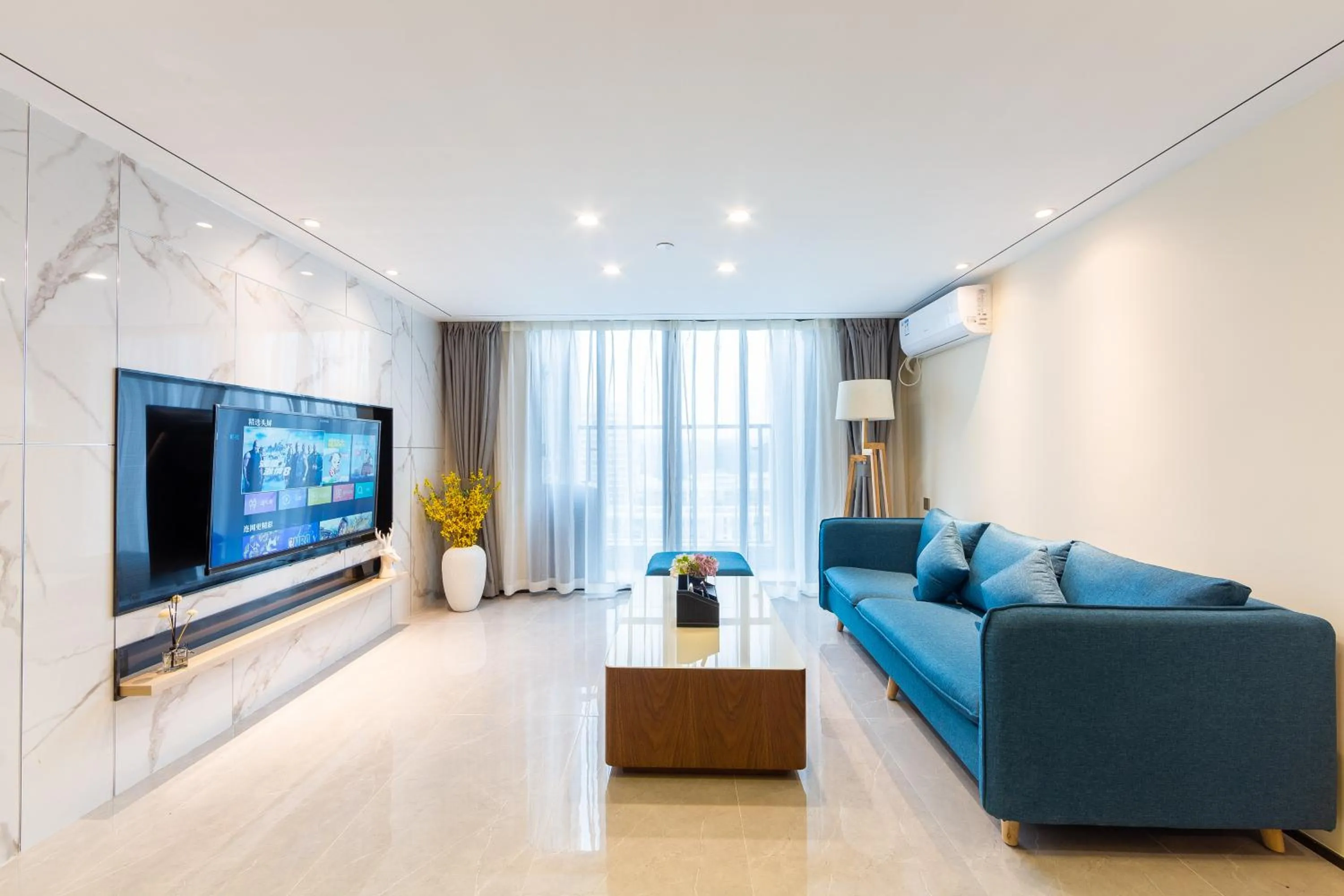TV and multimedia in Serveyou International Apartment - Free Airport Pickup & Free Canton Fair Shuttle Bus