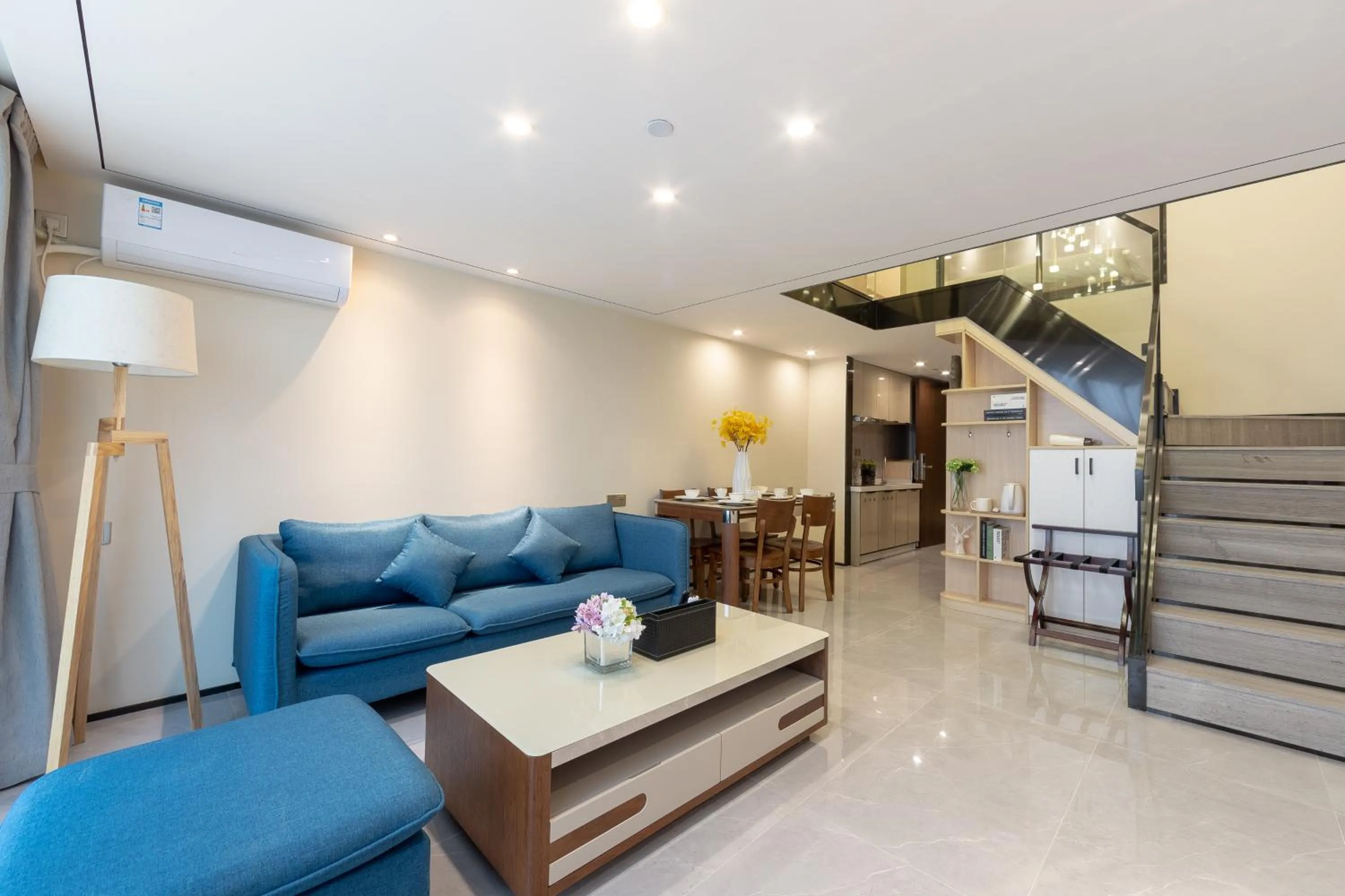 Living room in Serveyou International Apartment - Free Airport Pickup & Free Canton Fair Shuttle Bus