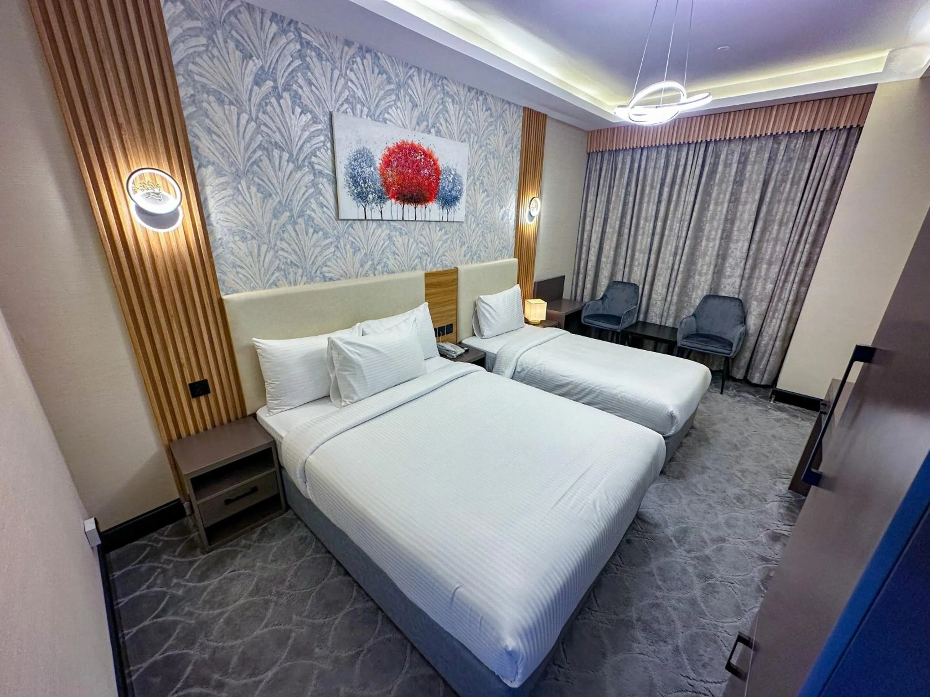 Photo of the whole room, Bed in GOLD SKY AVENUE HOTEL