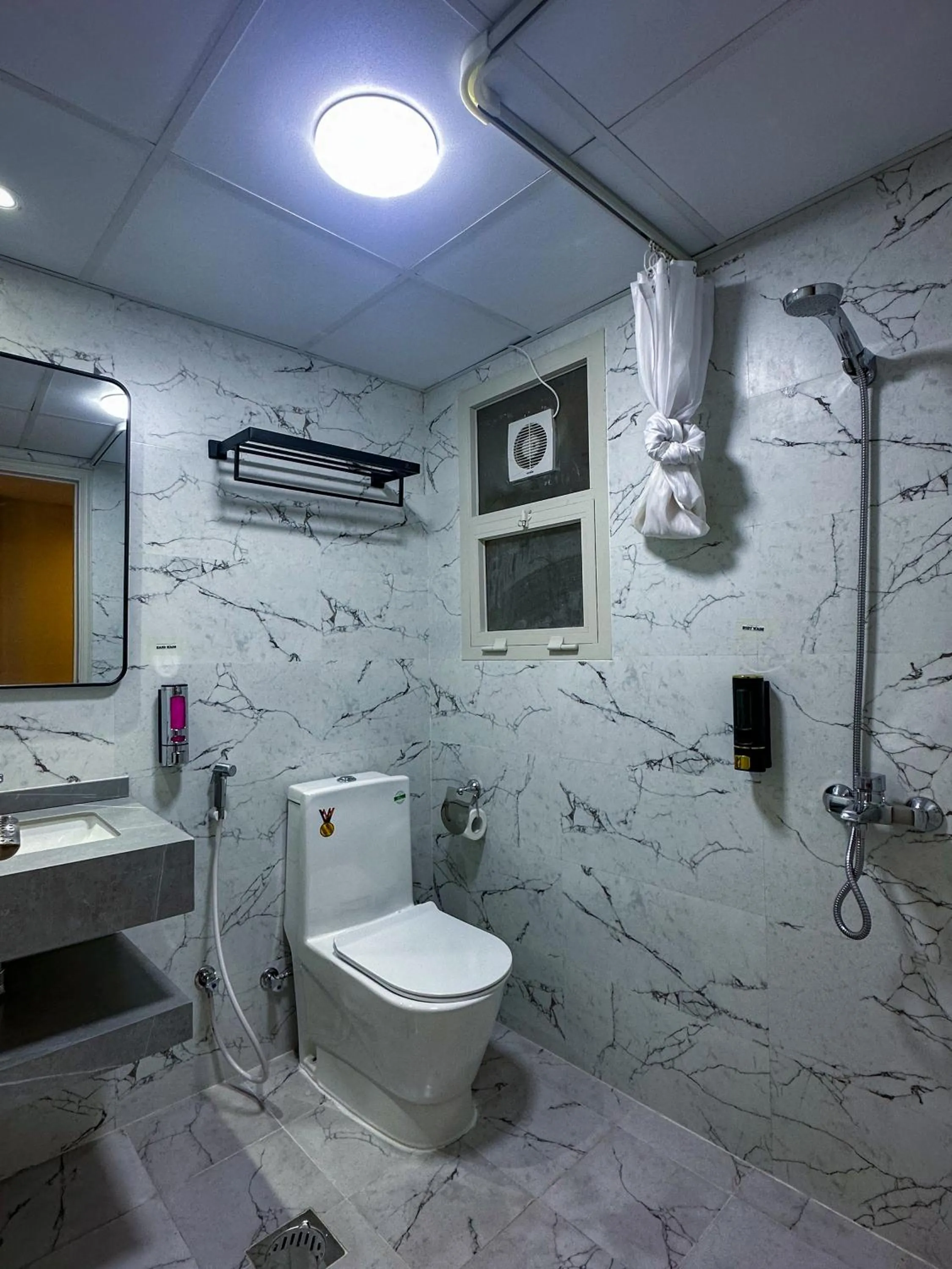 Bathroom in GOLD SKY AVENUE HOTEL