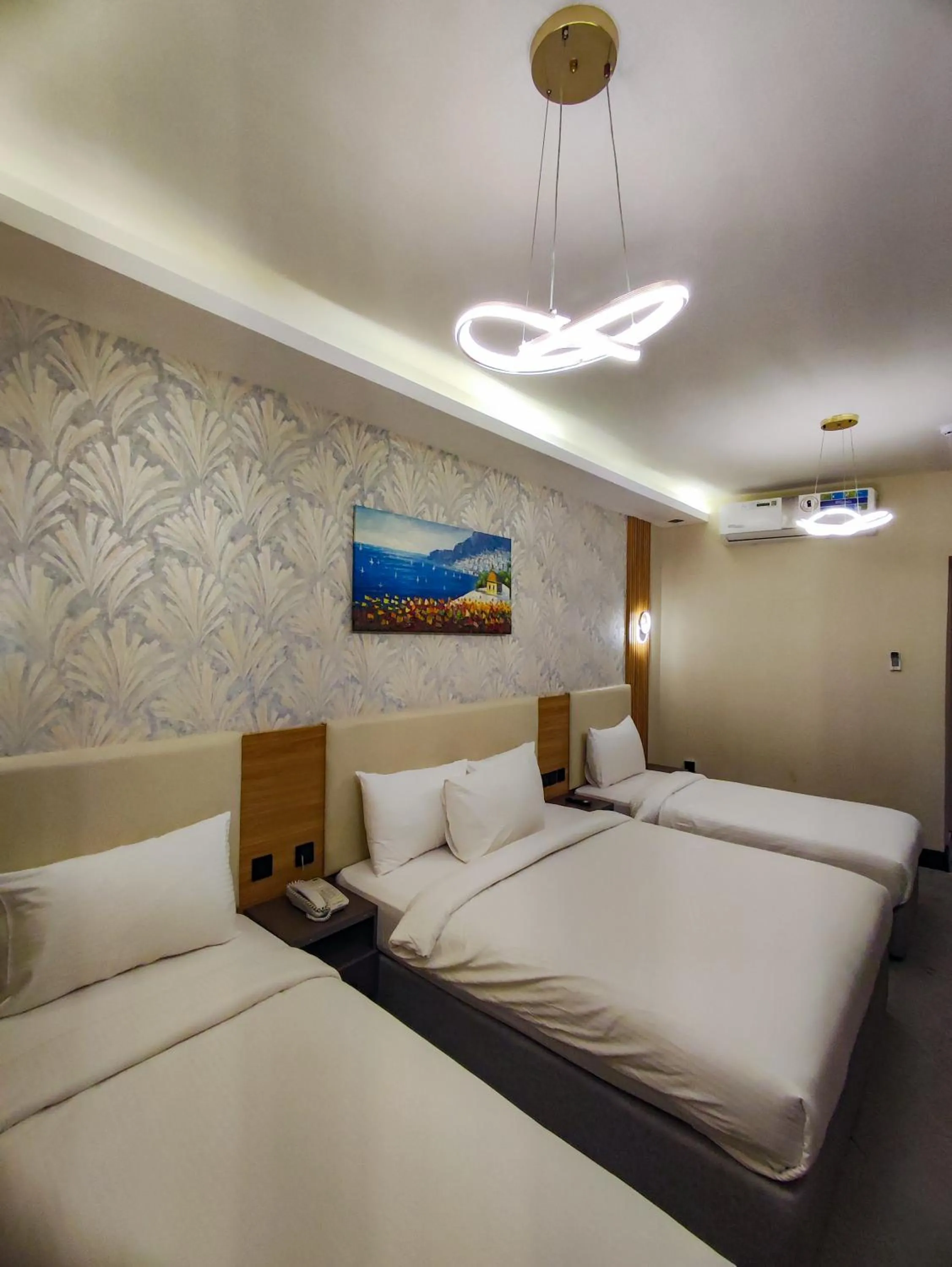 Photo of the whole room, Bed in GOLD SKY AVENUE HOTEL