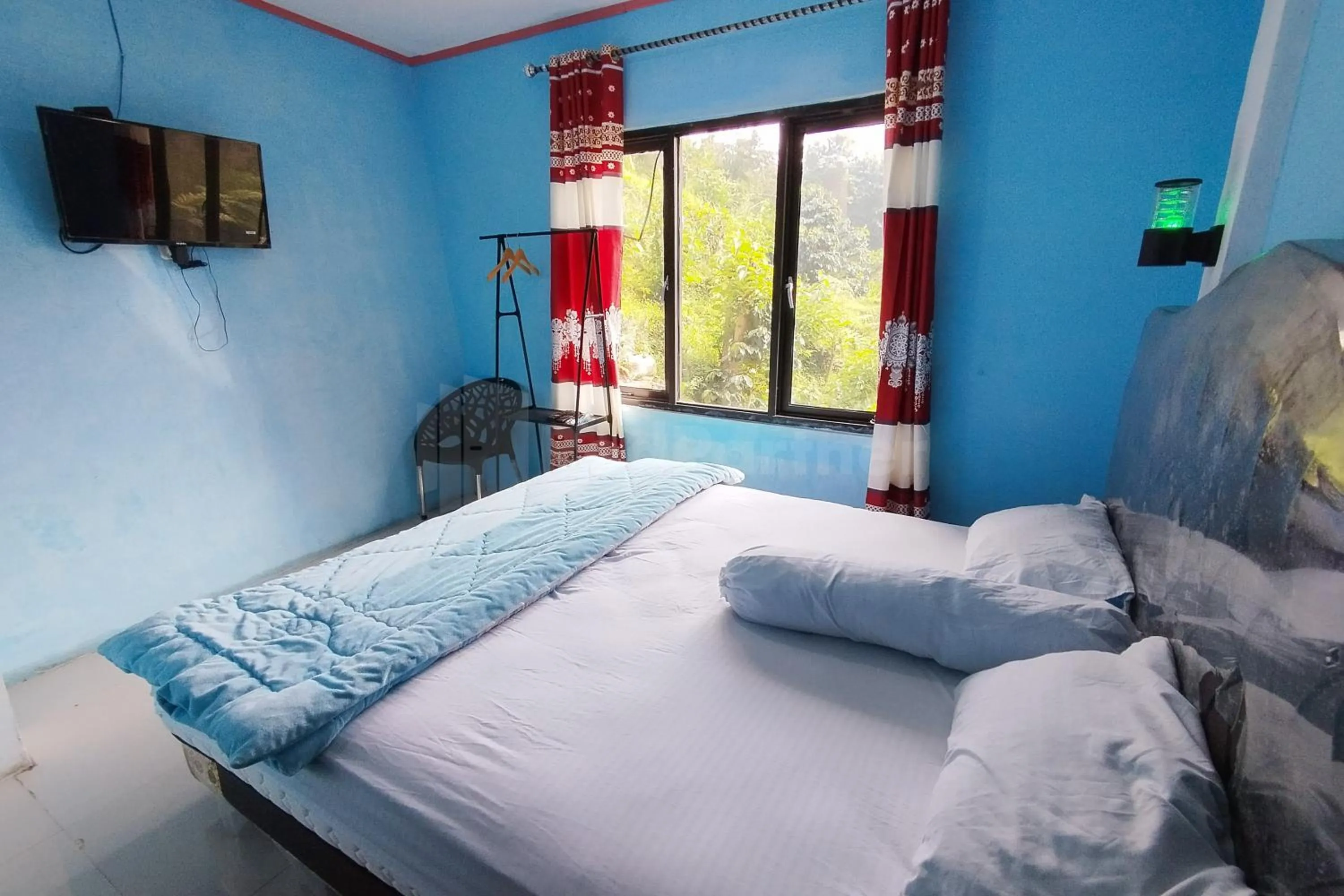 Bed in AS Resto,Café & Hotel Mitra RedDoorz