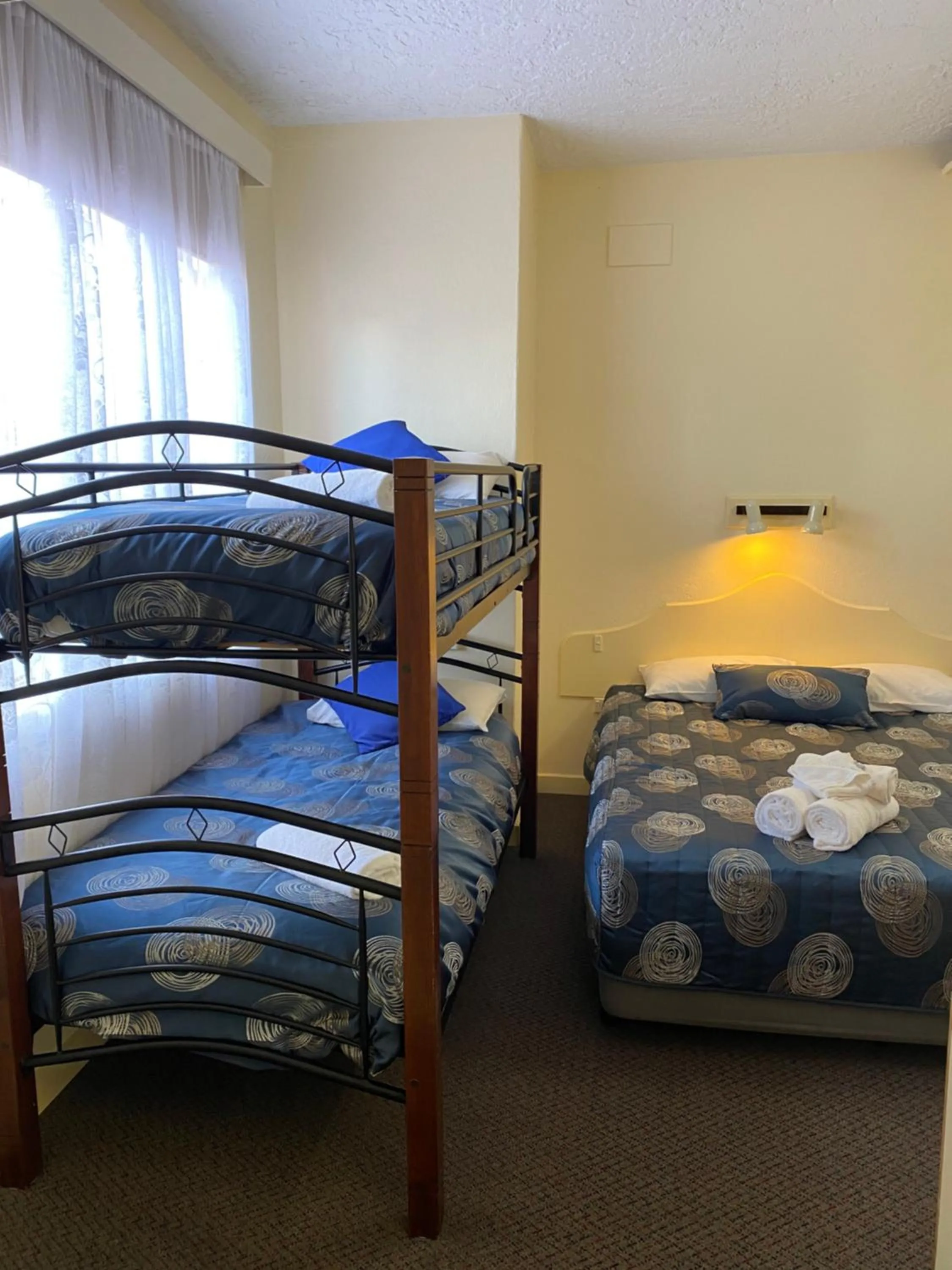 Bed in Paddle Steamer Motel