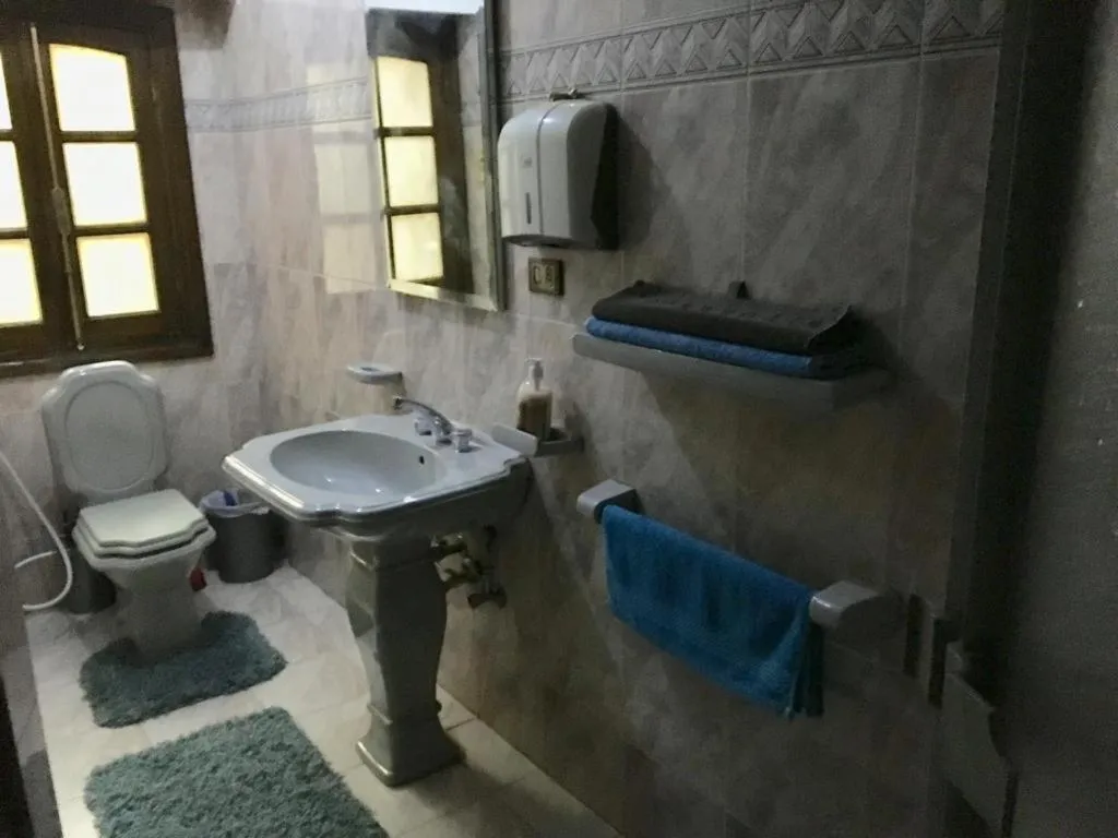 Toilet in One bedroom apartment city views local to Airport