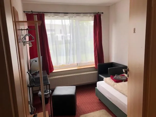 Photo of the whole room, Bed in Hotel Saarland Lebach