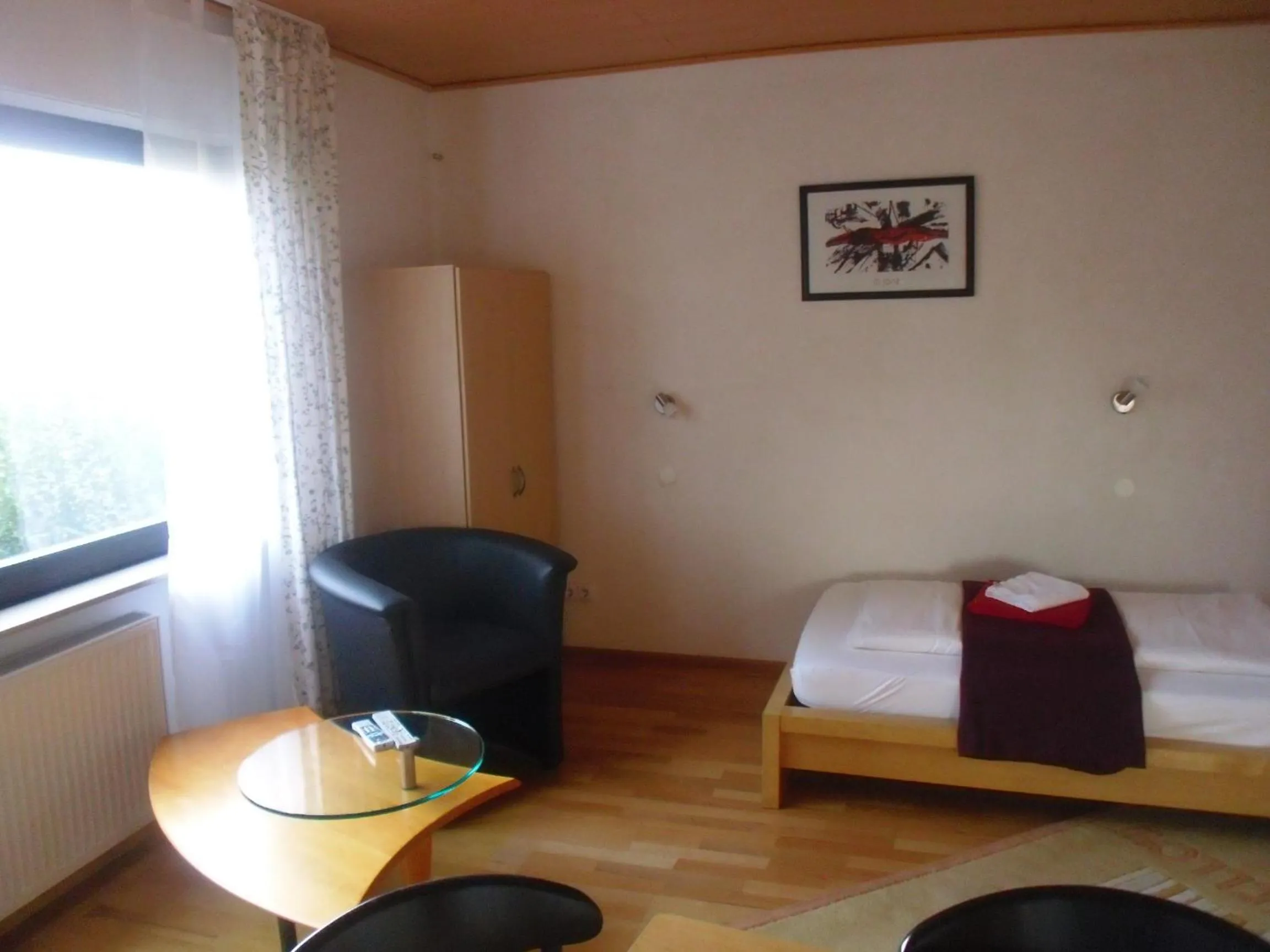Photo of the whole room, Bed in Hotel Saarland Lebach