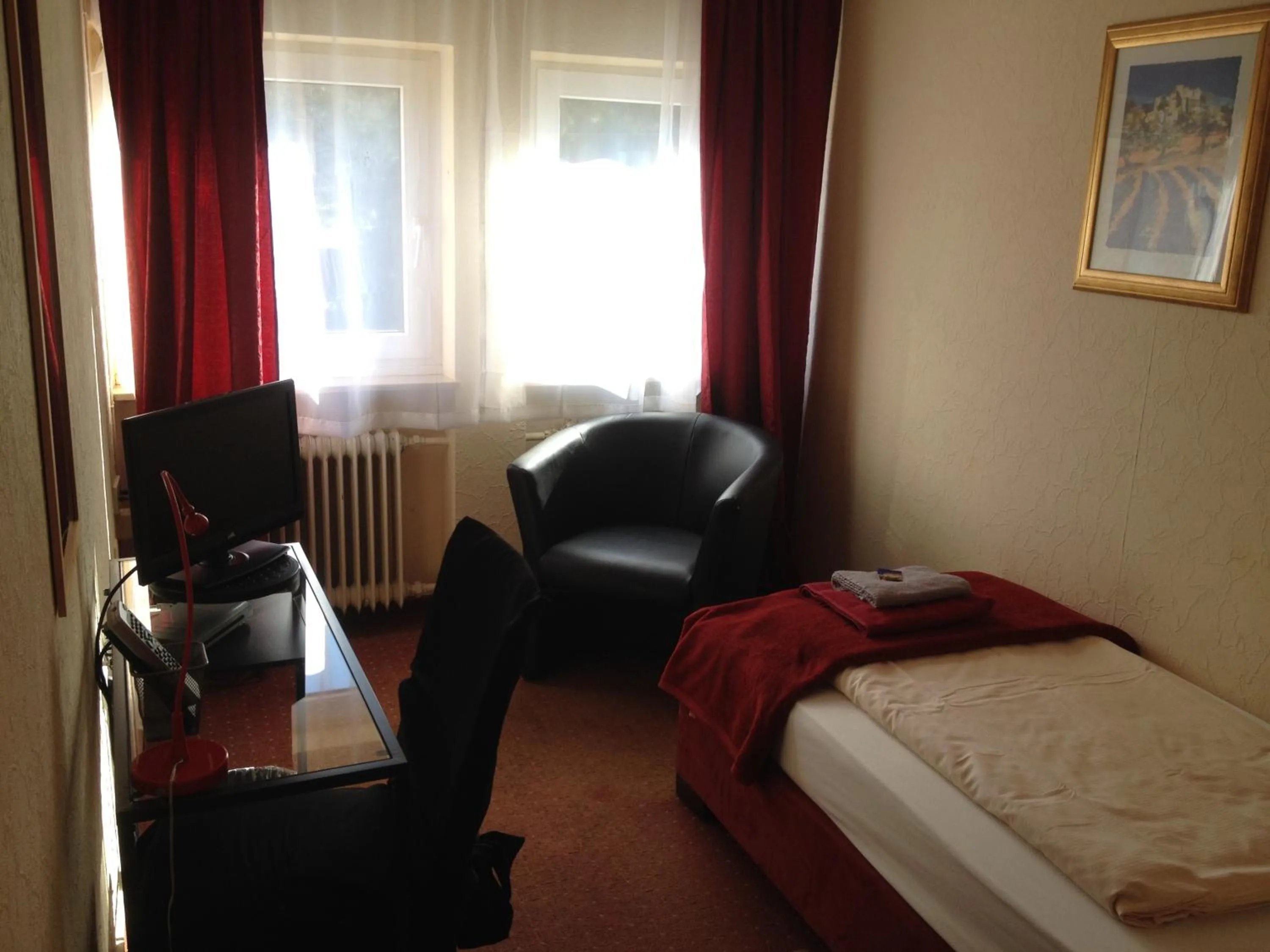 Photo of the whole room, Bed in Hotel Saarland Lebach
