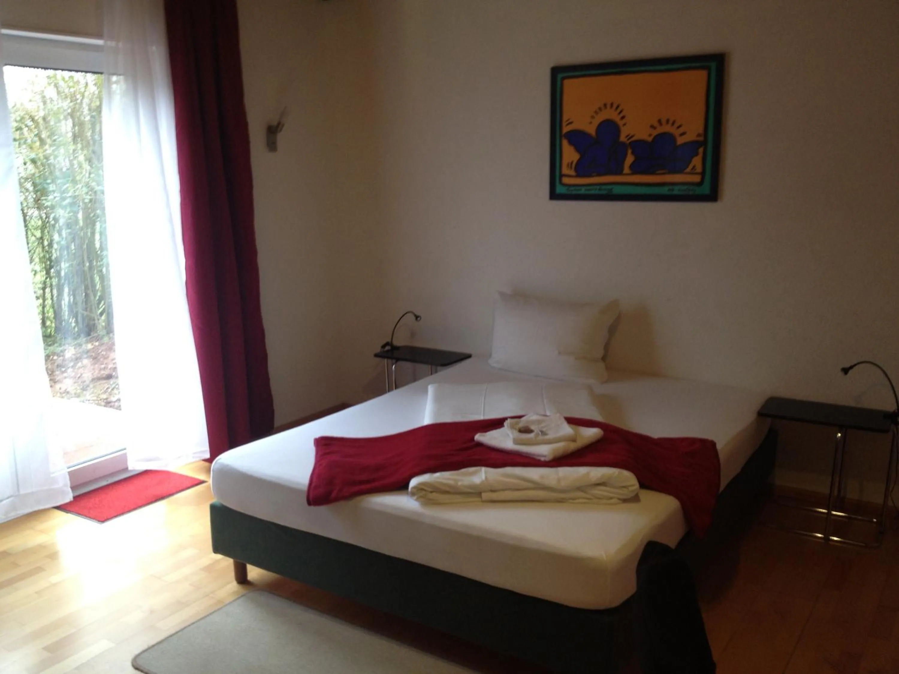 Photo of the whole room, Bed in Hotel Saarland Lebach