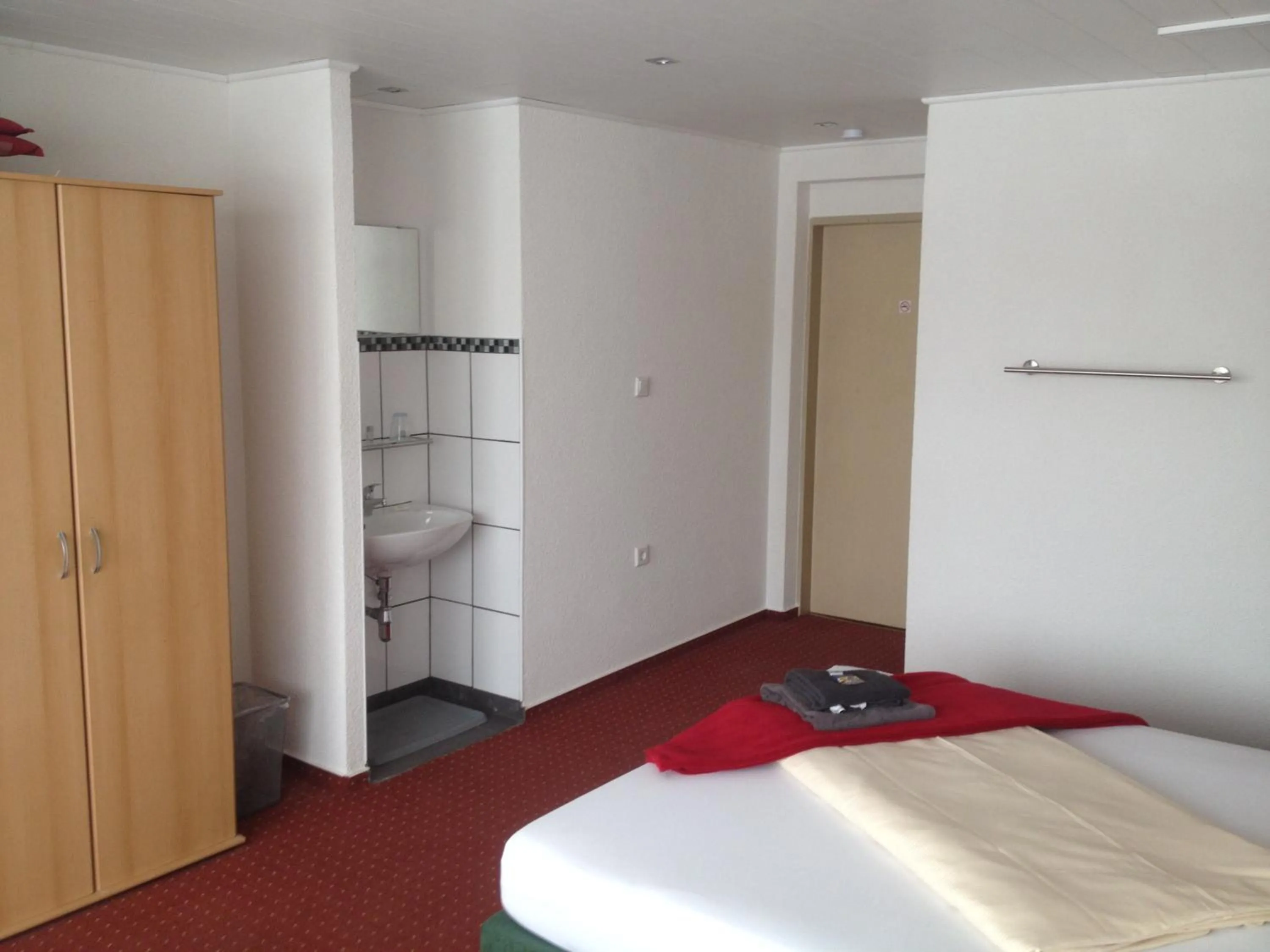 Photo of the whole room, Bed in Hotel Saarland Lebach