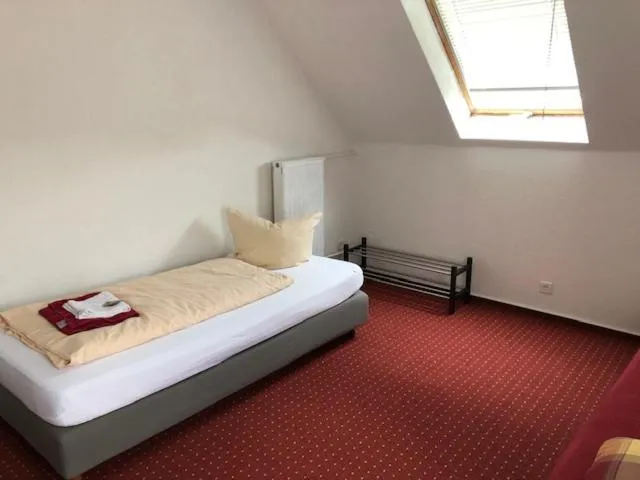 Bedroom, Bed in Hotel Saarland Lebach
