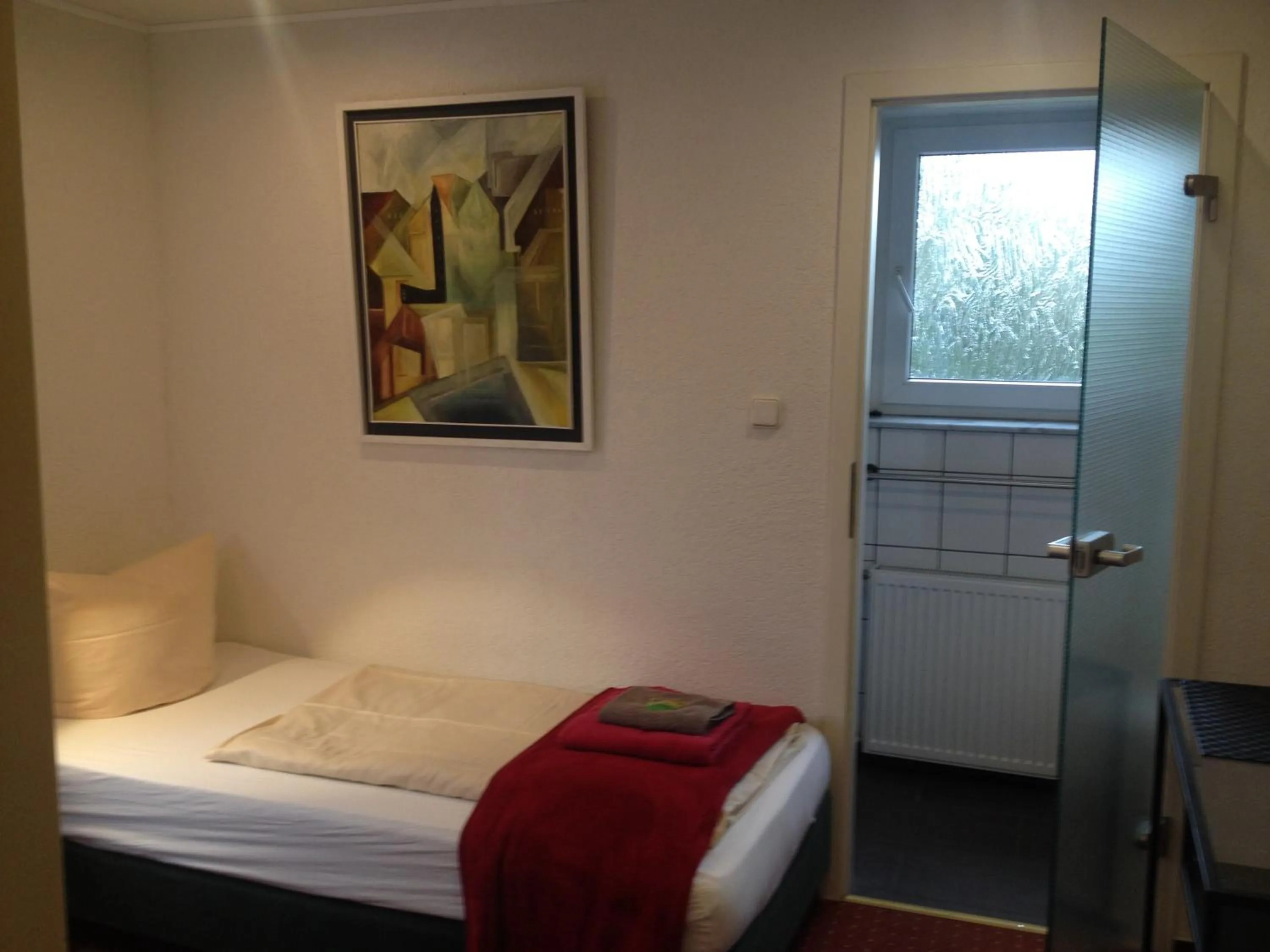 Photo of the whole room, Bed in Hotel Saarland Lebach