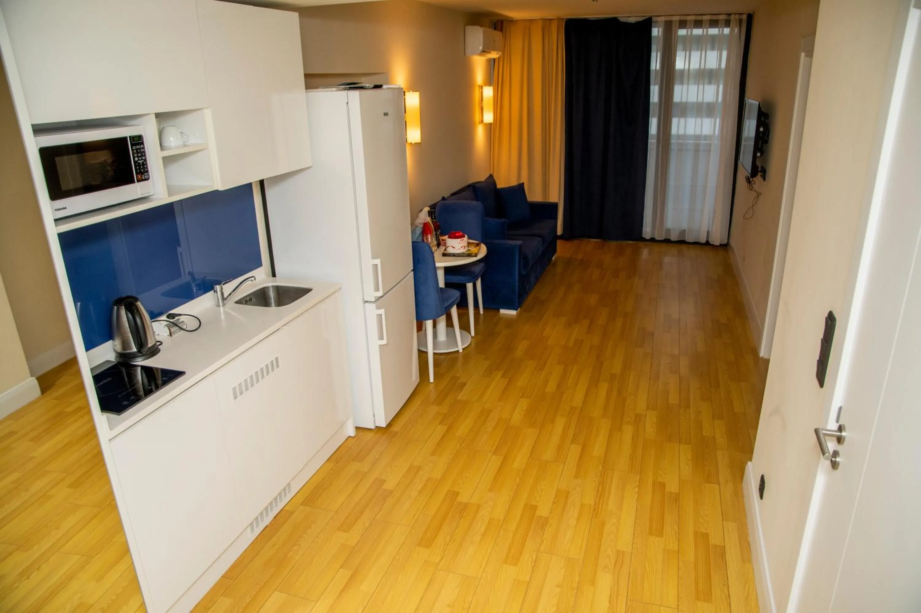 Kitchen or kitchenette in Orbi City Hotel