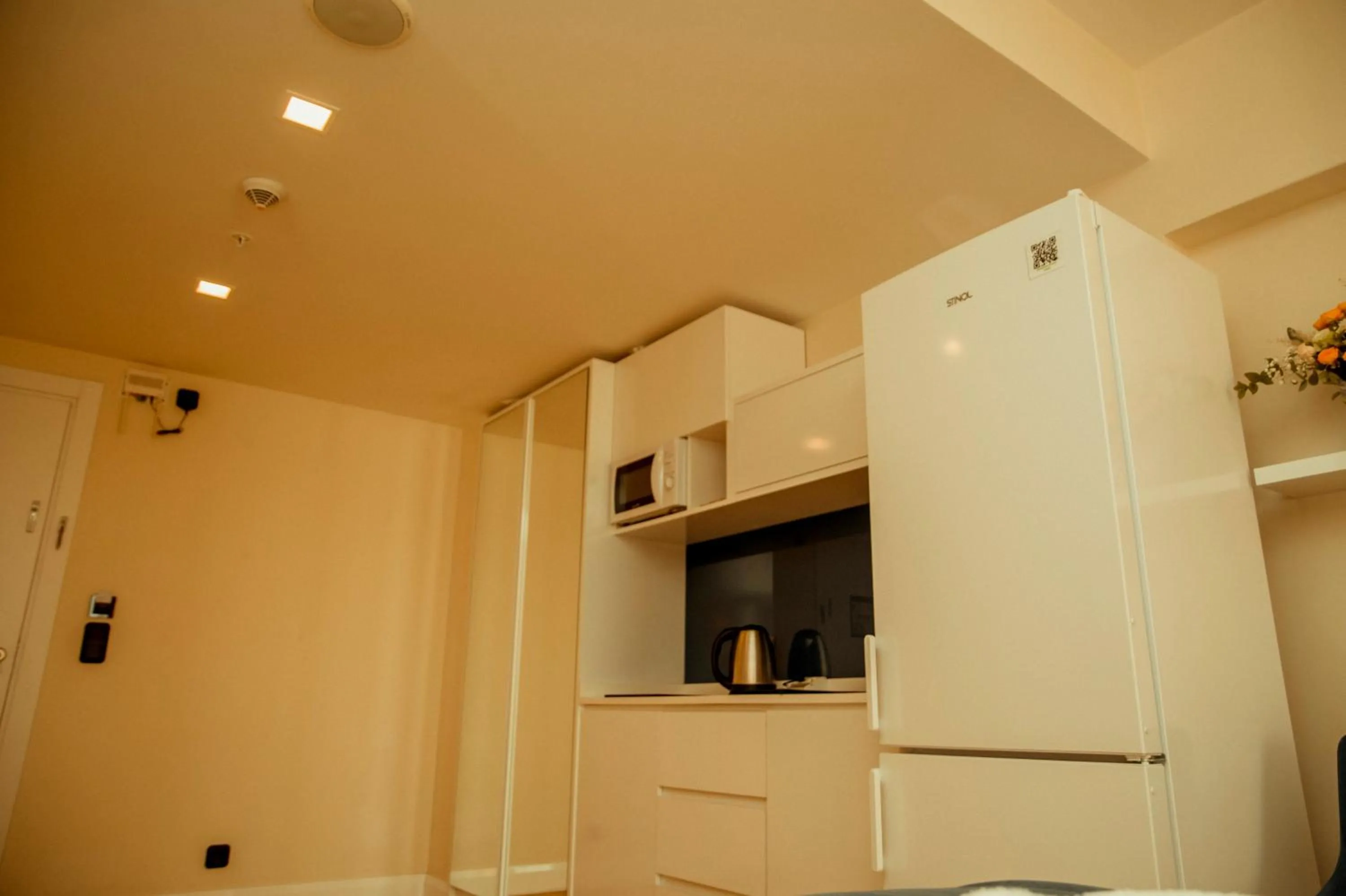 Kitchen or kitchenette in Orbi City Hotel