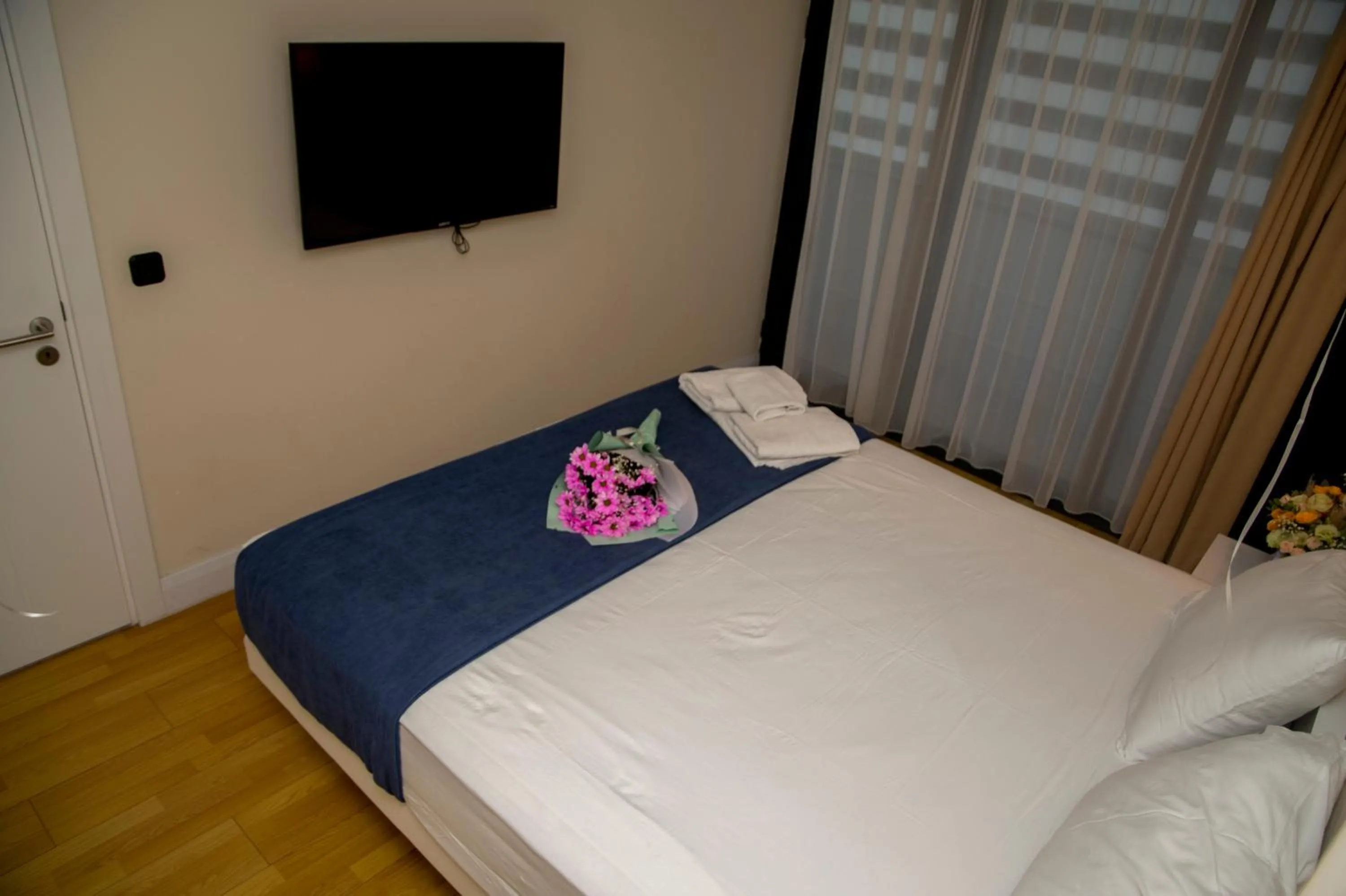 Bed in Orbi City Hotel