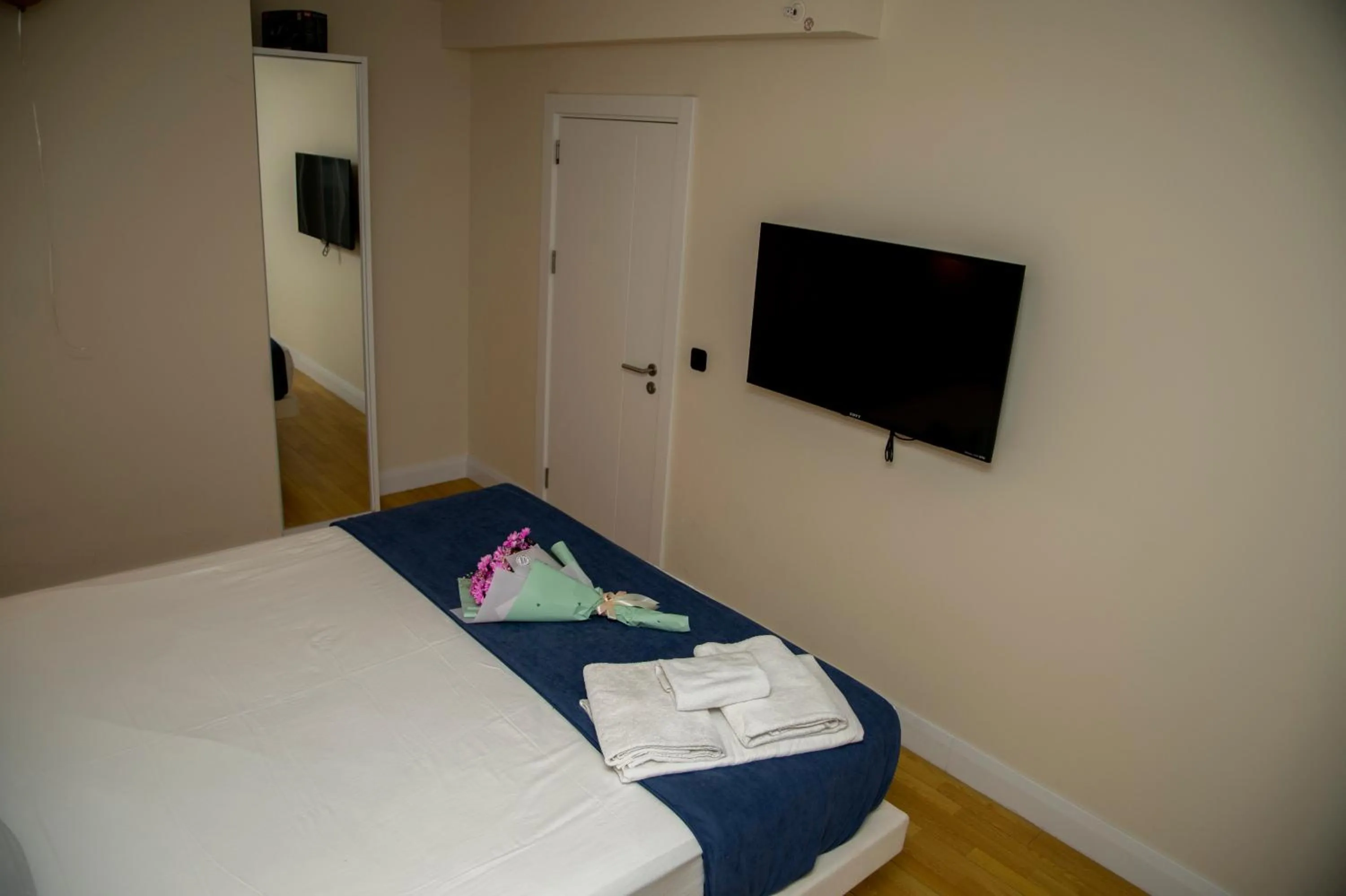 Bed in Orbi City Hotel