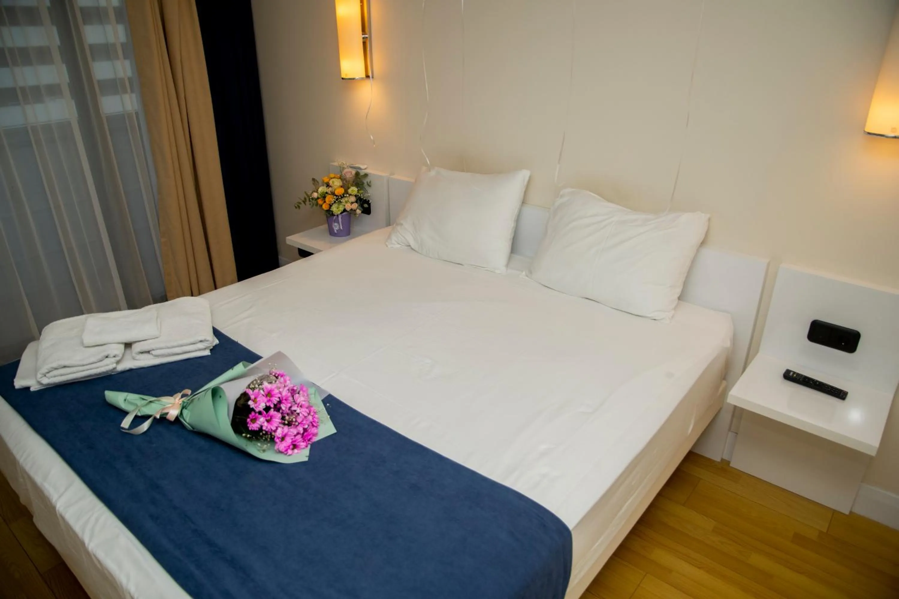 Bed in Orbi City Hotel