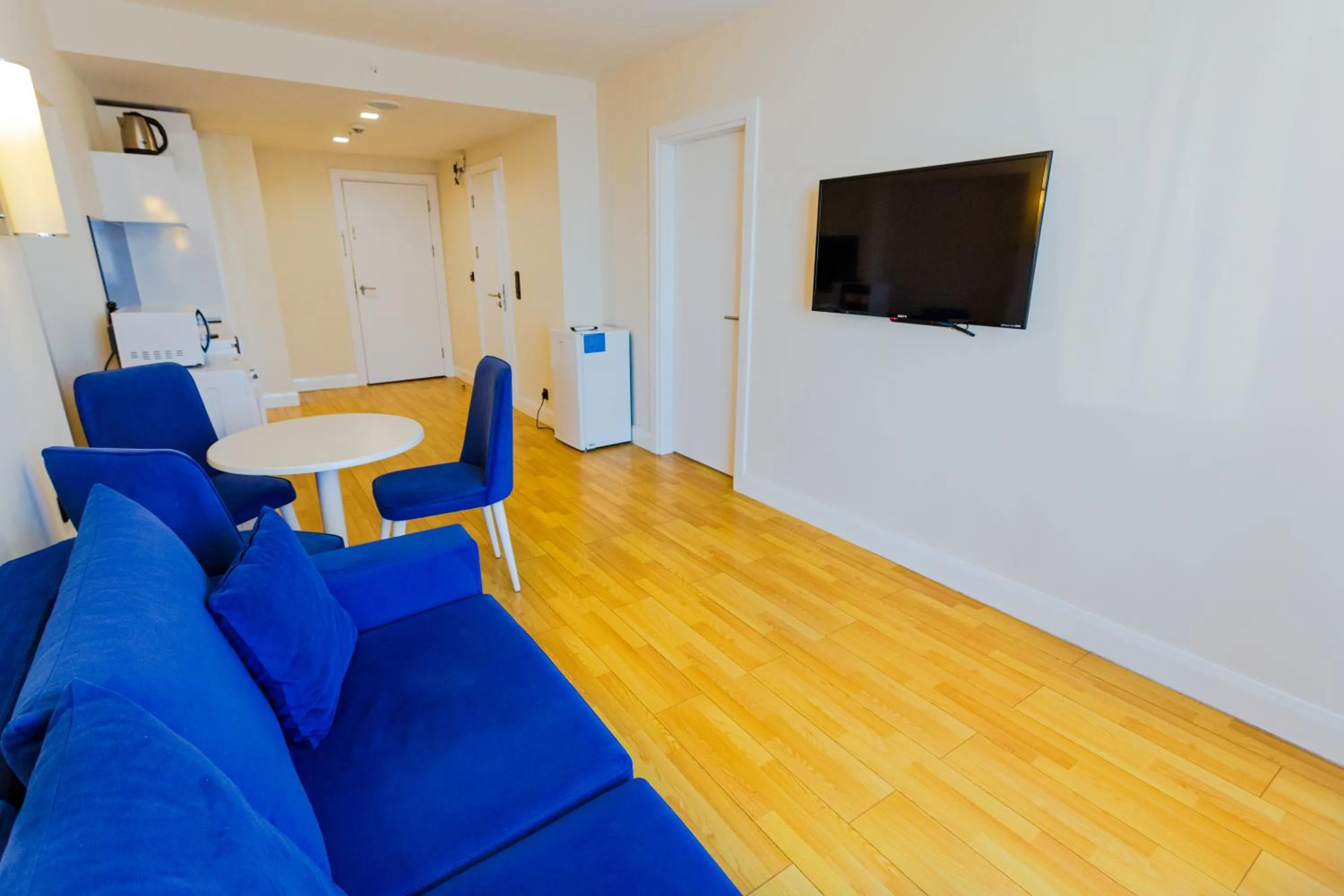 Communal lounge/ TV room in Orbi City Hotel