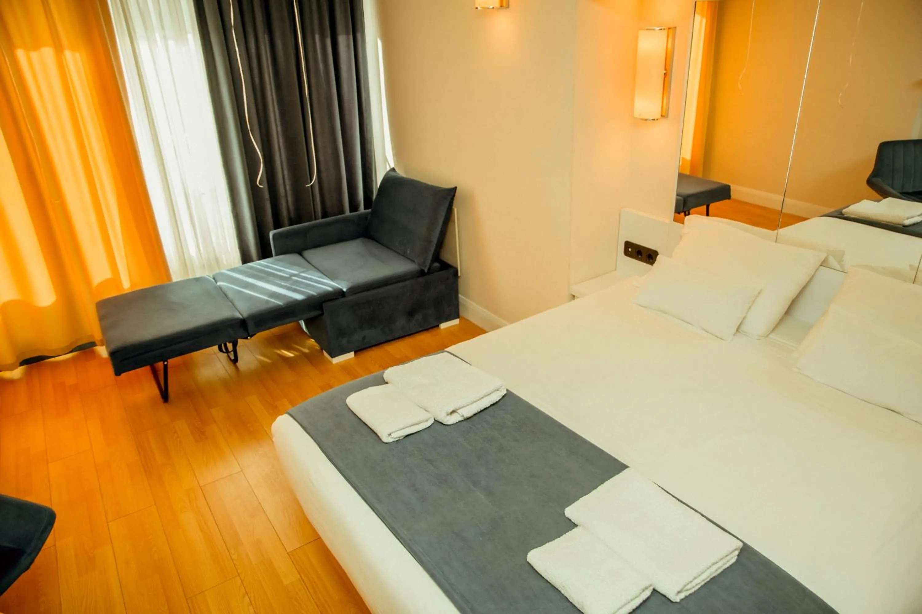 Bed in Orbi City Hotel