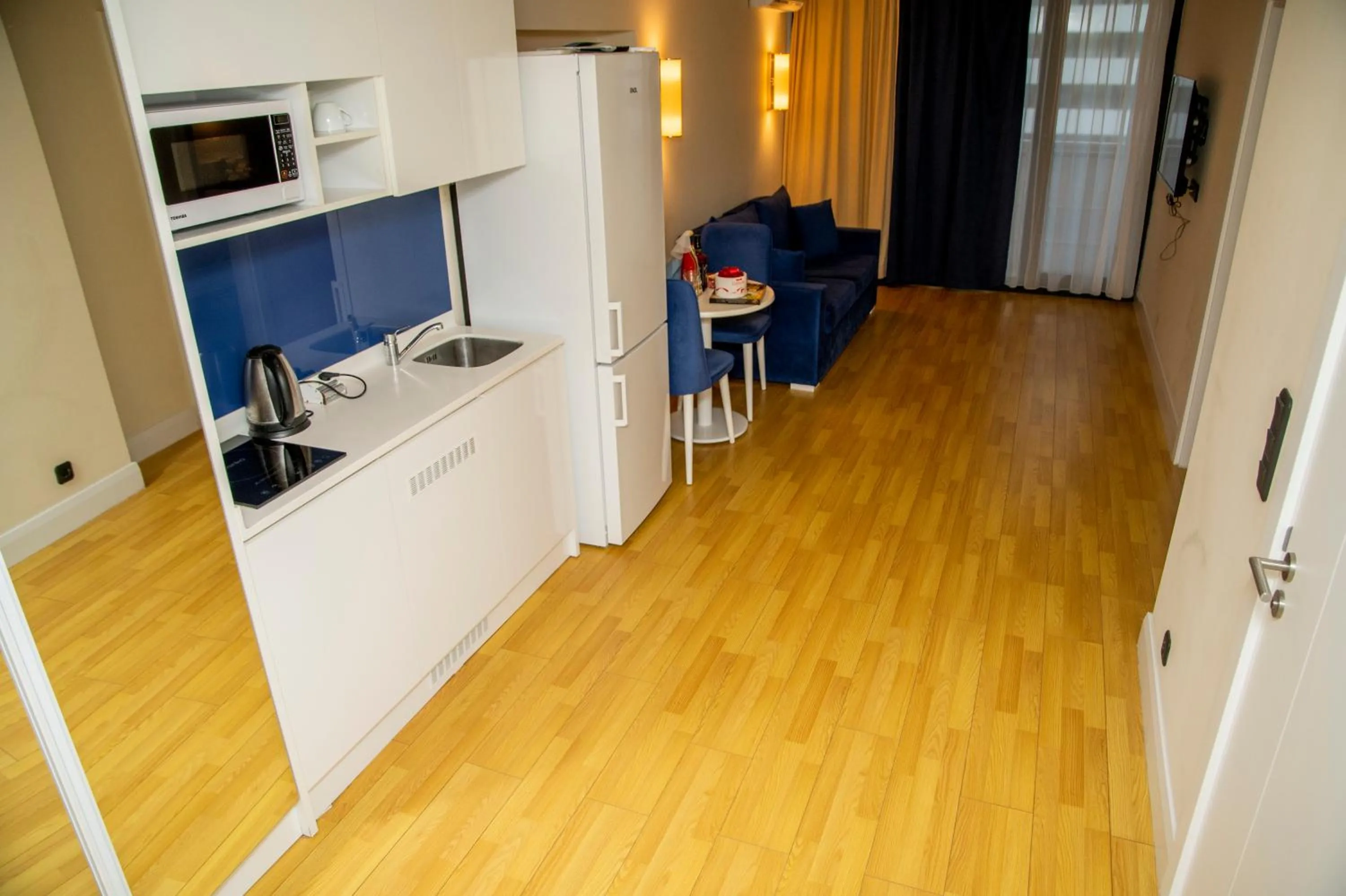 Kitchen or kitchenette in Orbi City Hotel