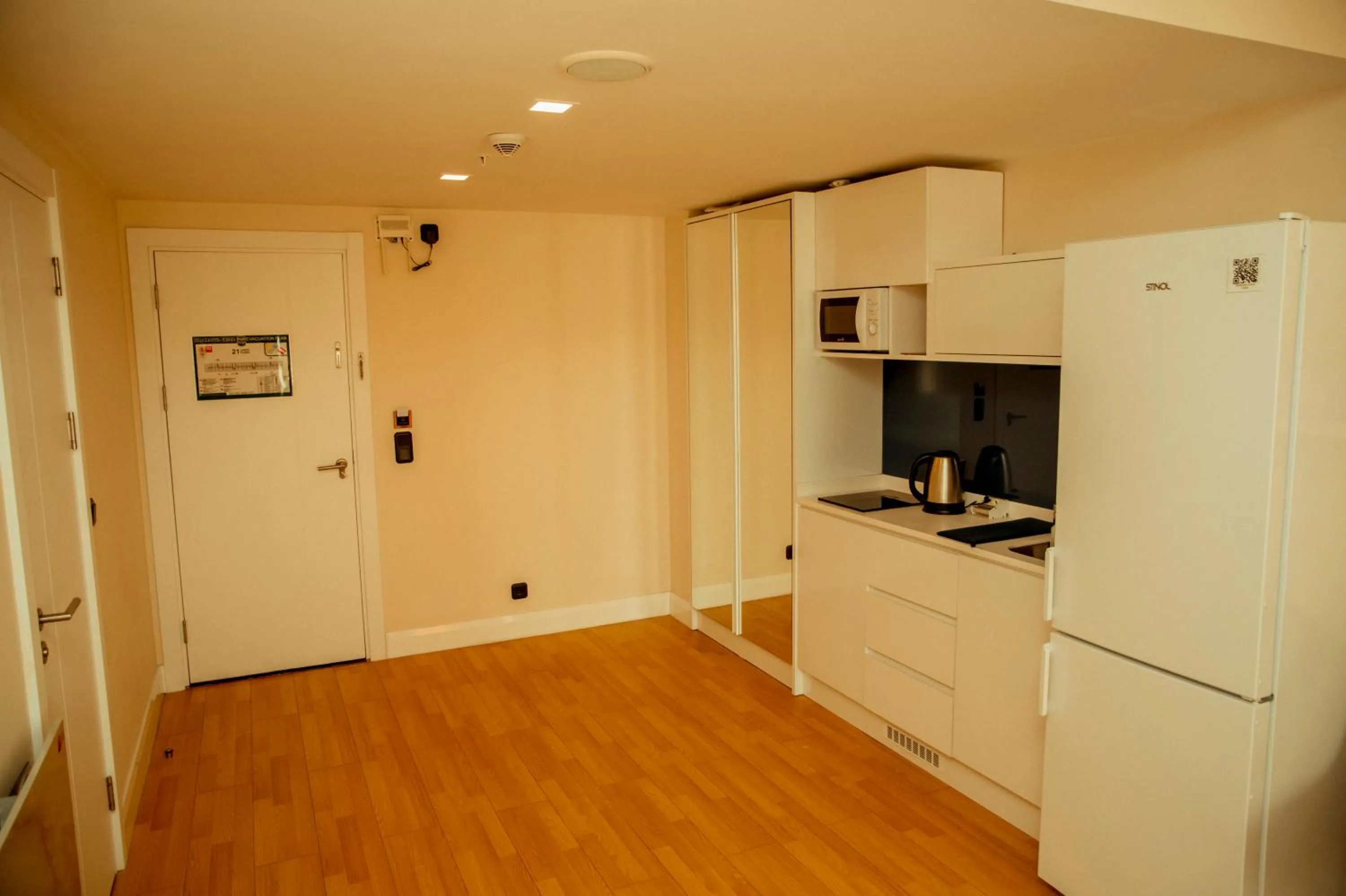 Kitchen or kitchenette in Orbi City Hotel