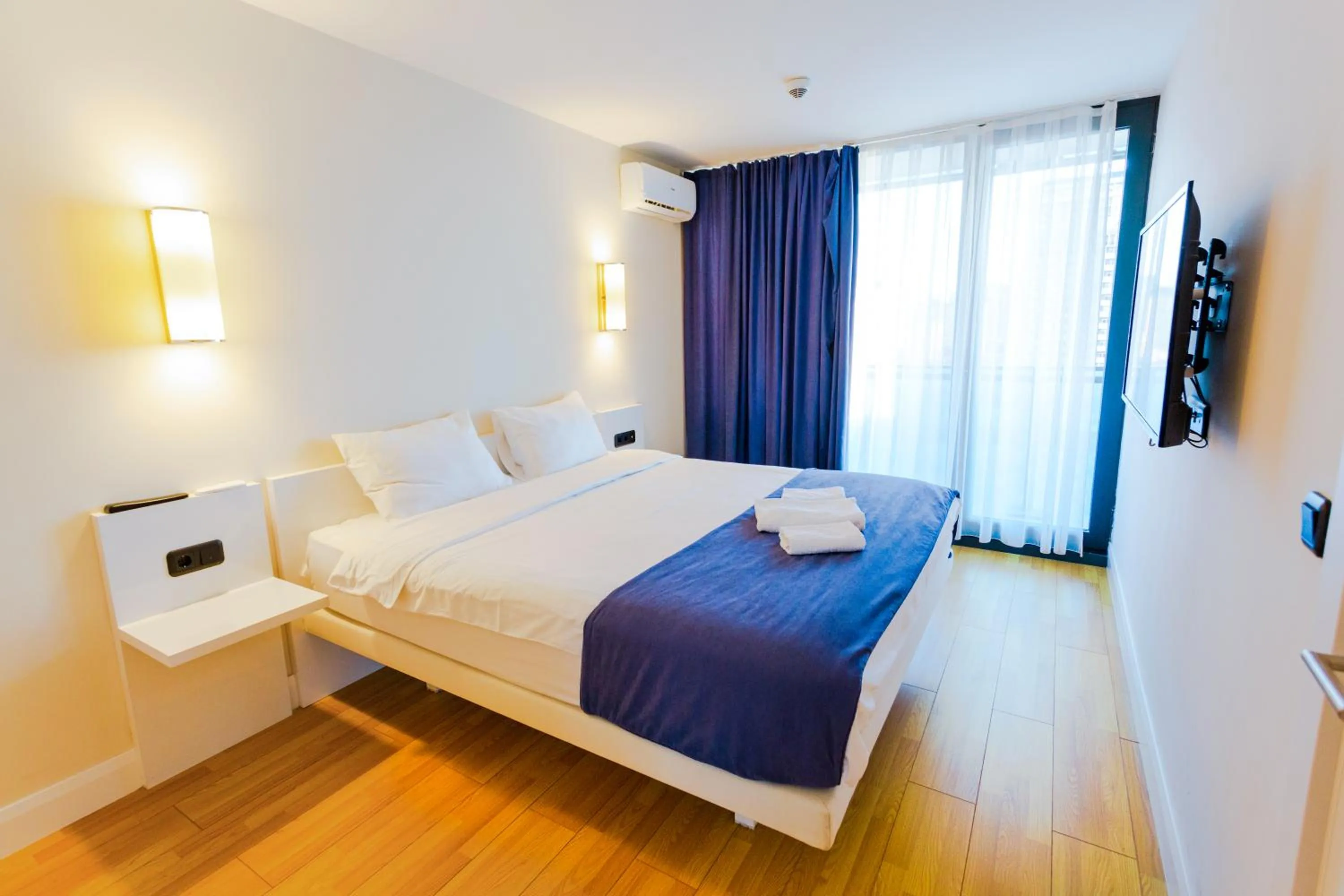 Bed in Orbi City Hotel