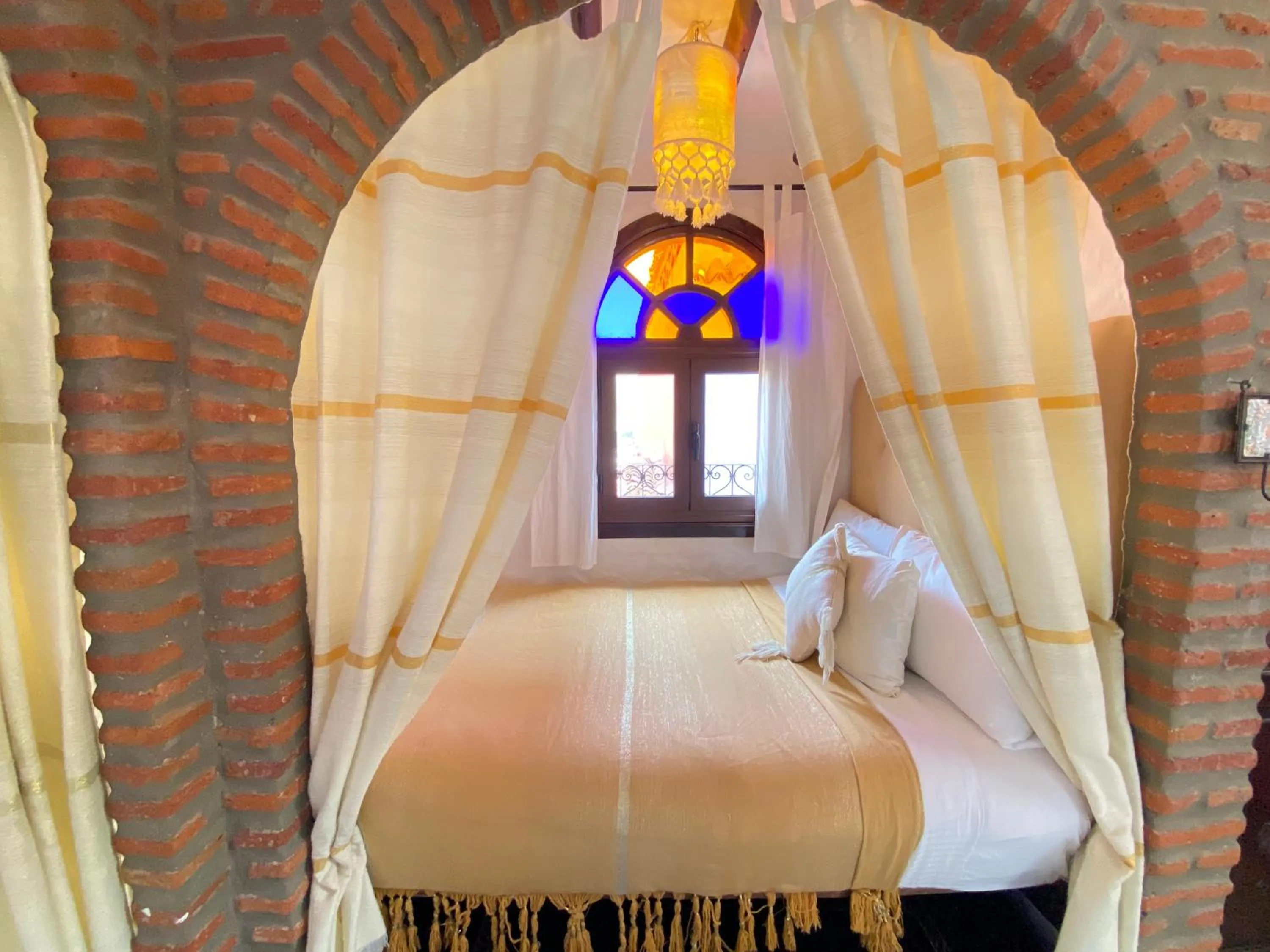 Bed in Riad Gharnata