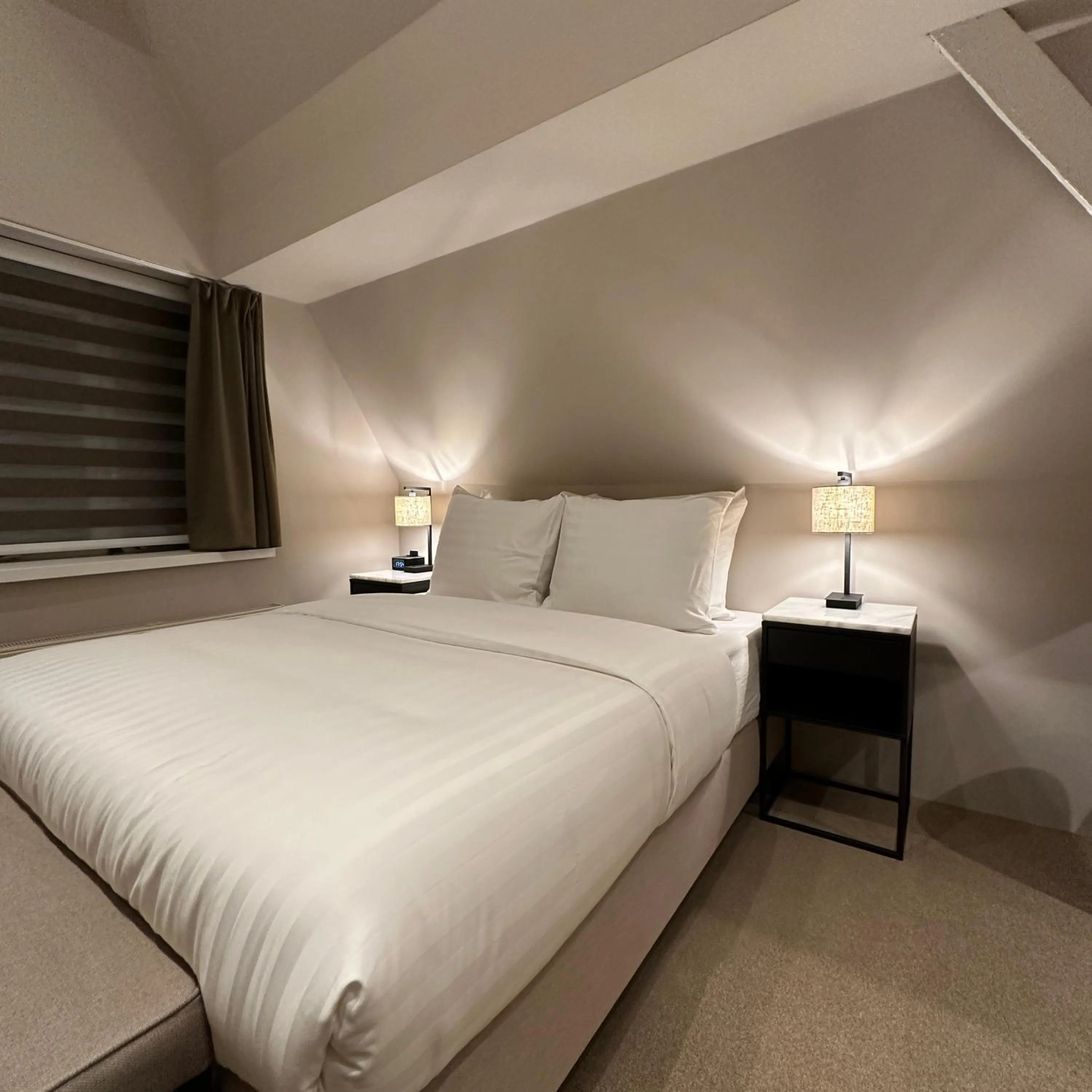 Bed in Hotel Grand Canal