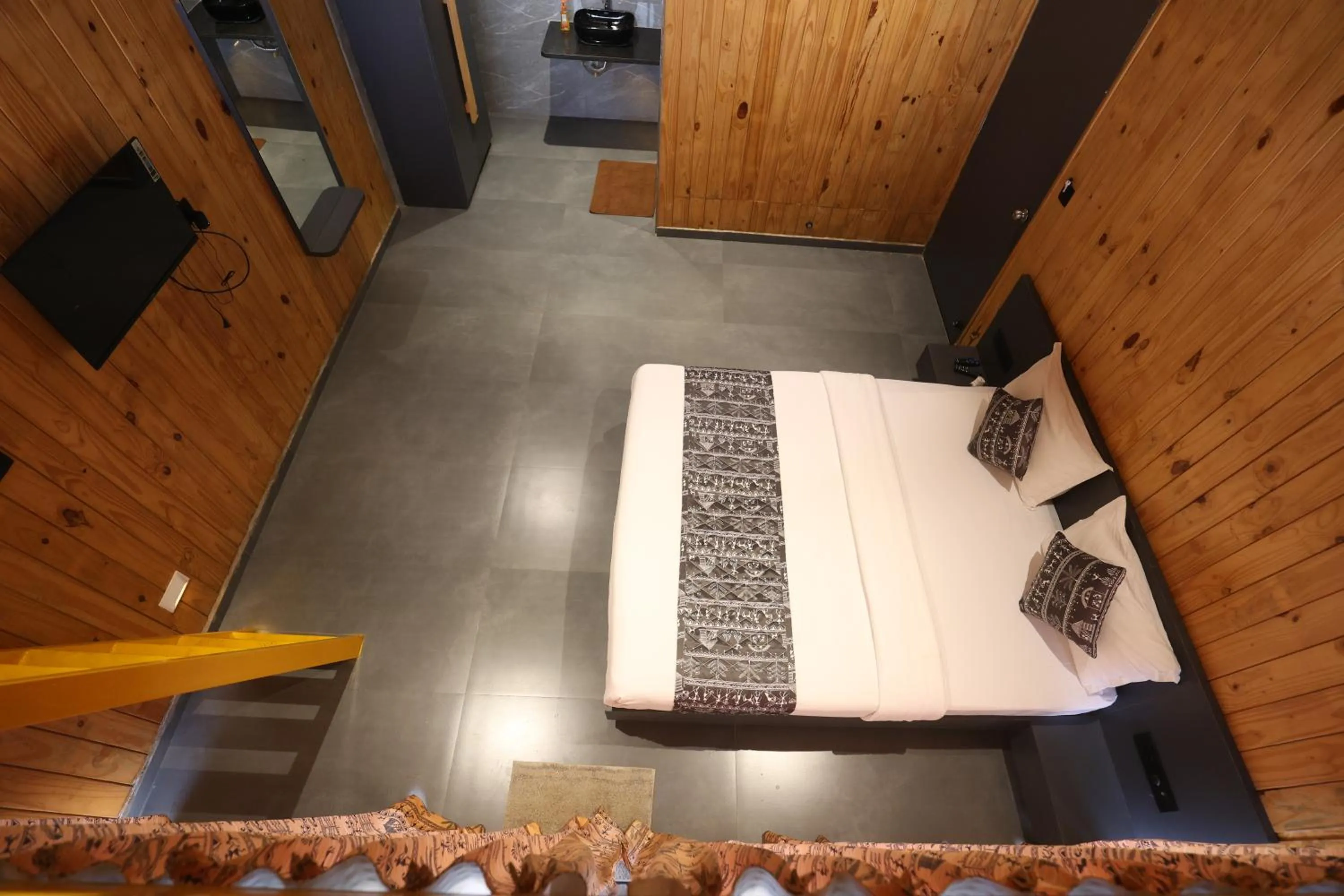 Living room, Bed in Shreephal luxurious Resort- Best resort in saputara