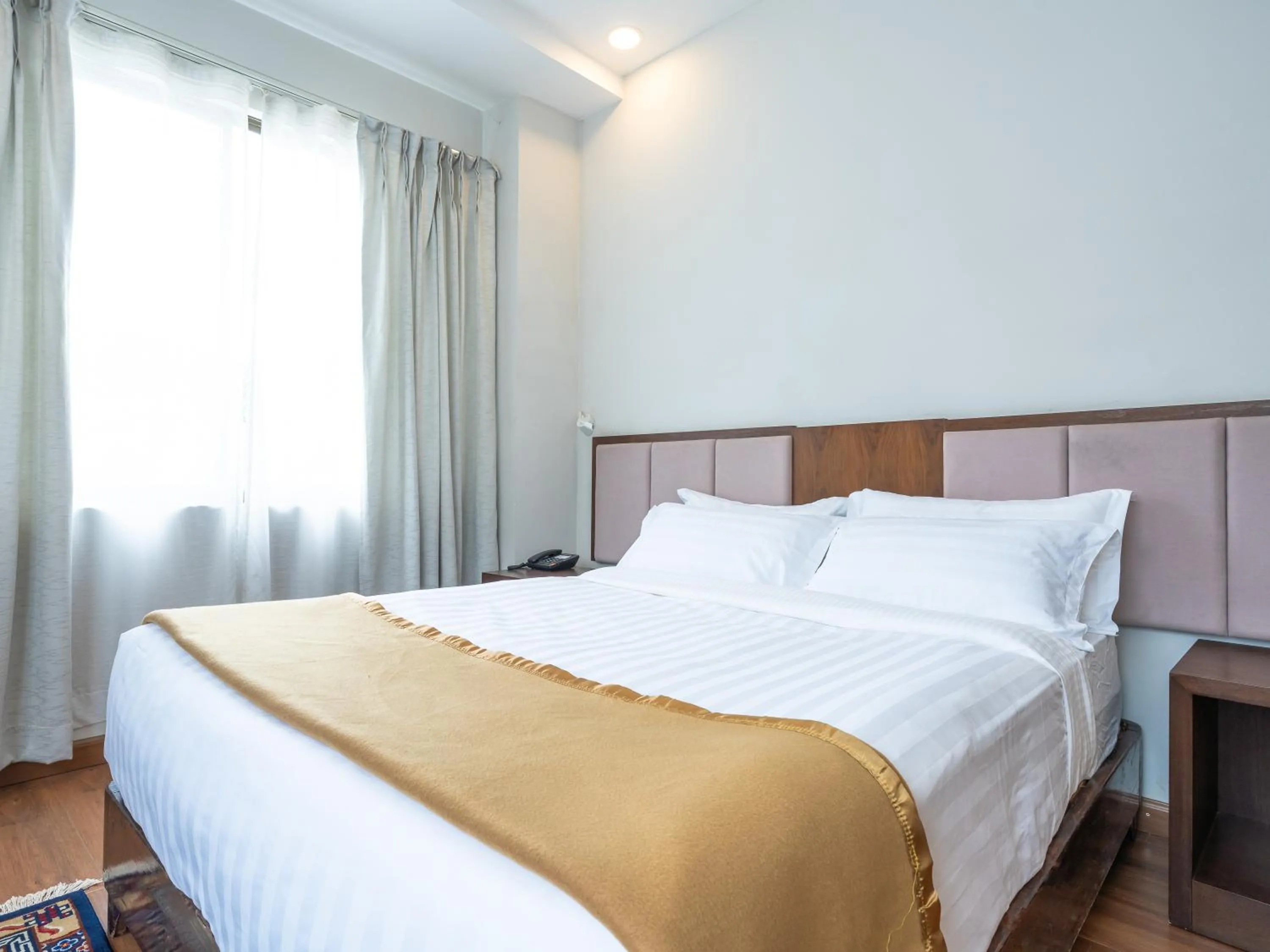 Property building, Bed in Hotel Samye - Best Hotel In Thimphu