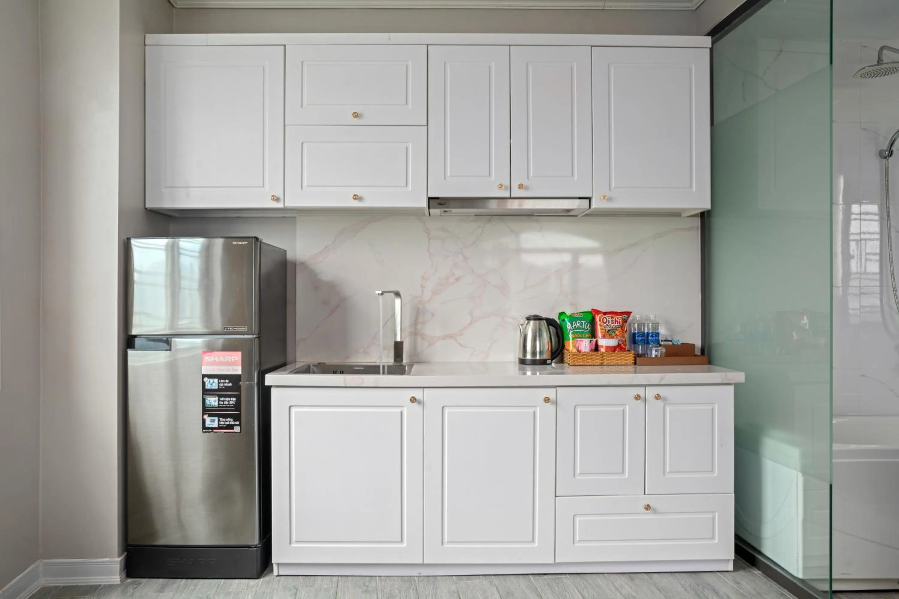 Kitchen or kitchenette in Lupin Boutique Hotel Danang