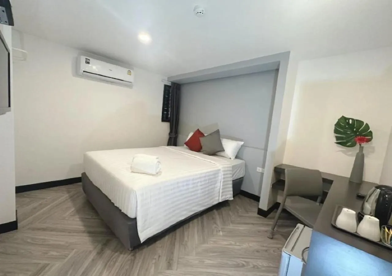 Bed in 14 Sathorn Hotel