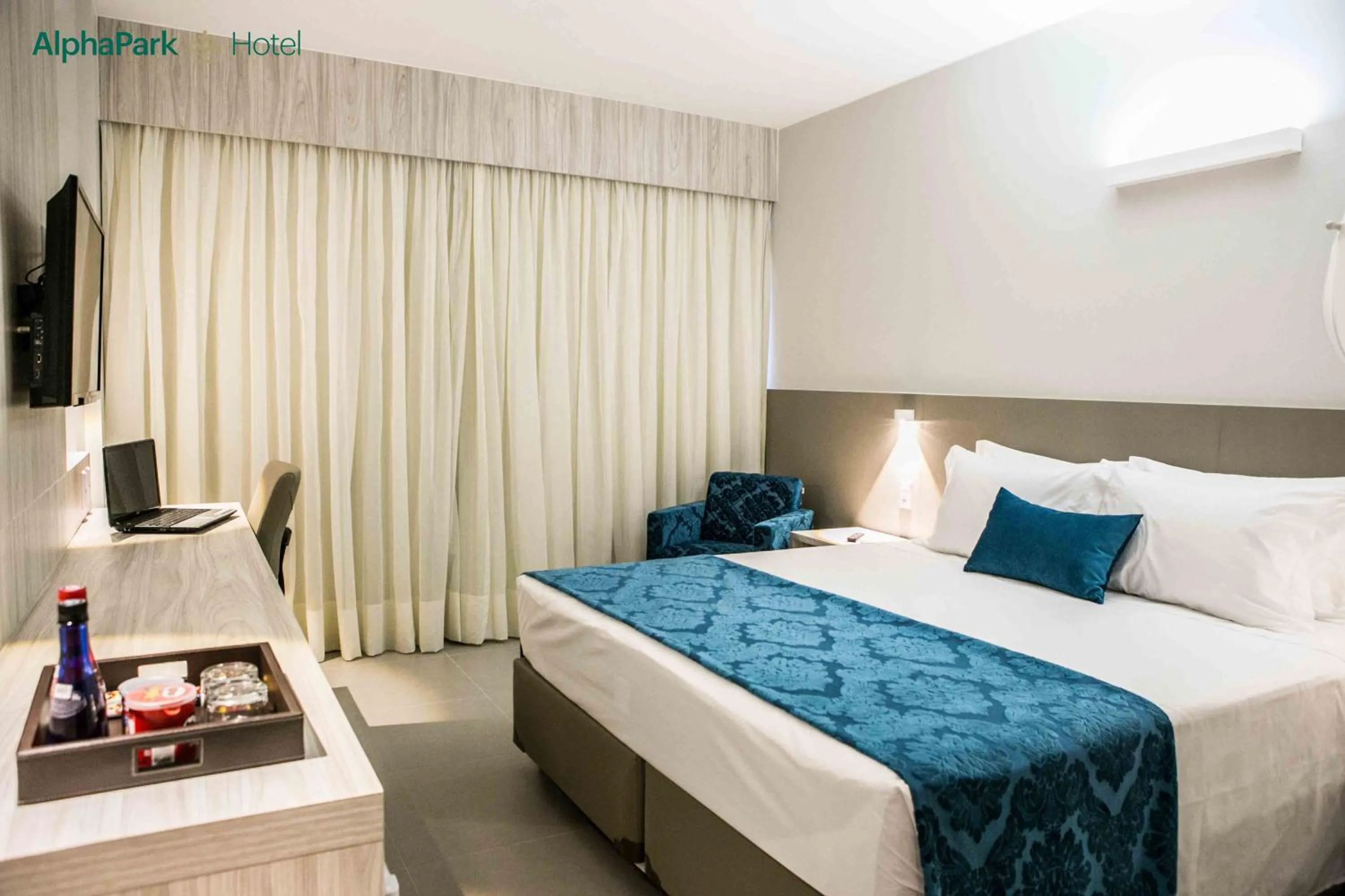 Bed in AlphaPark Hotel