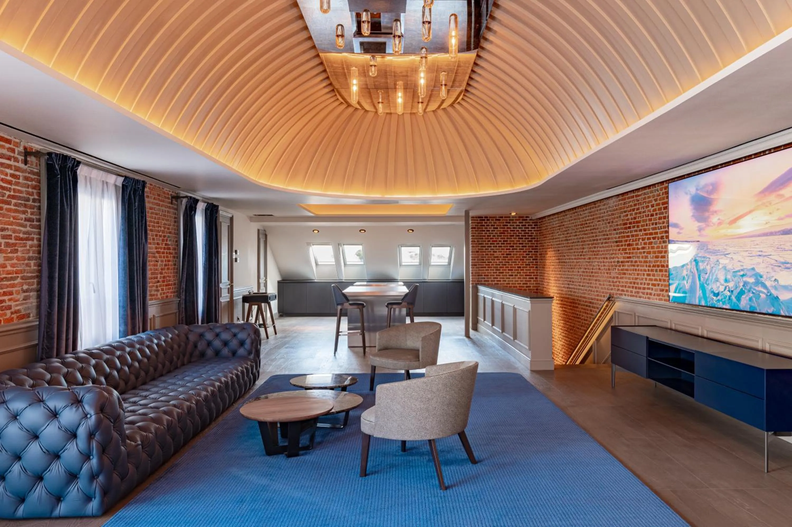 Communal lounge/ TV room in Casa Faraona Luxury Residences