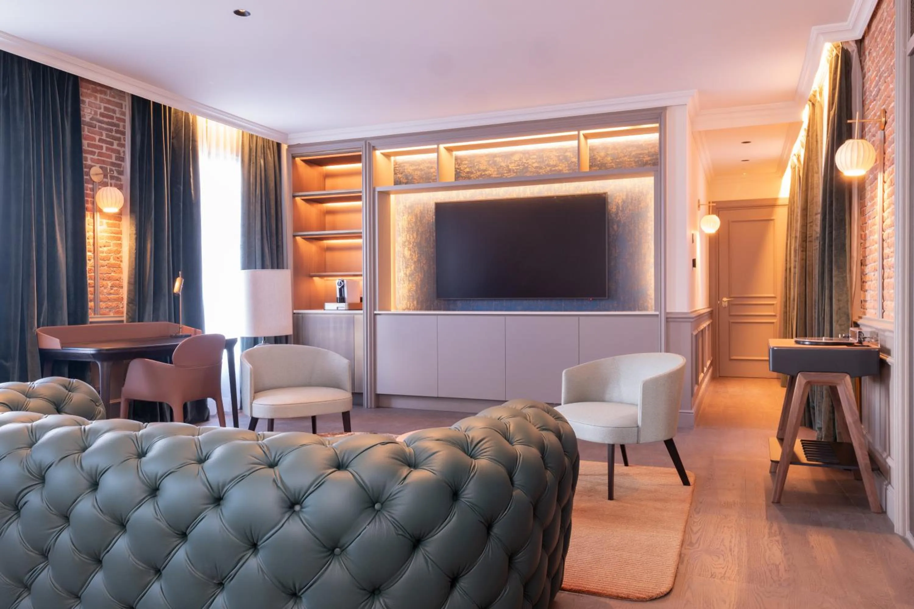 Communal lounge/ TV room in Casa Faraona Luxury Residences