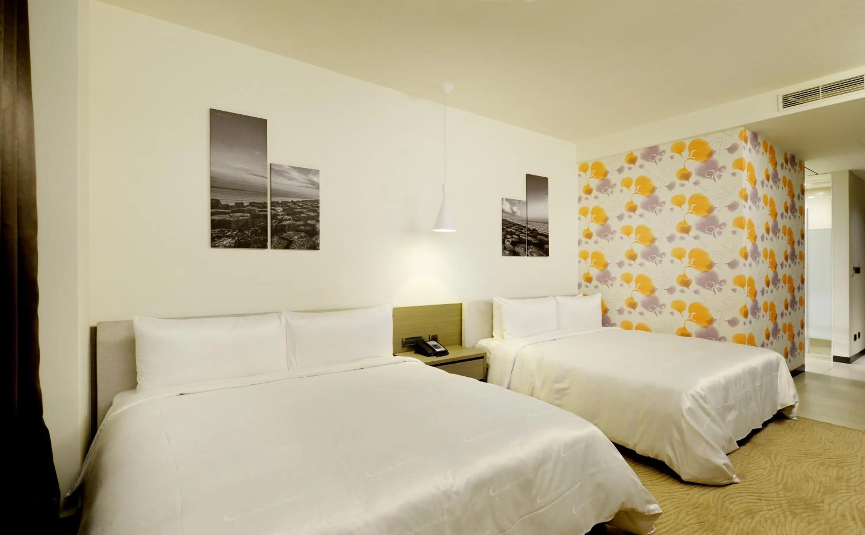 Bed in Golden Tulip Glory Fine Hotel