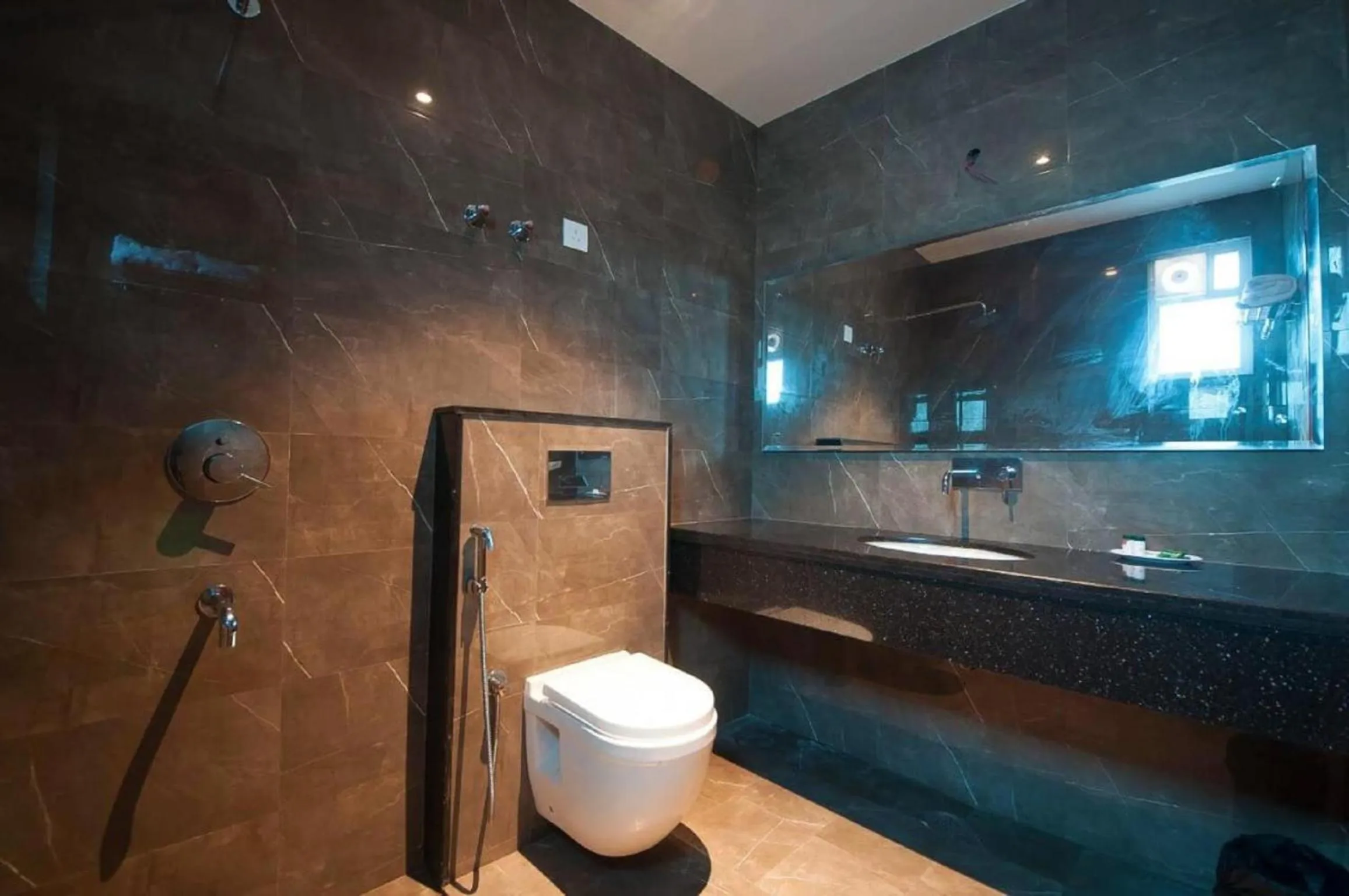 Bathroom in Hotel Z Suites with FREE Airport Drop